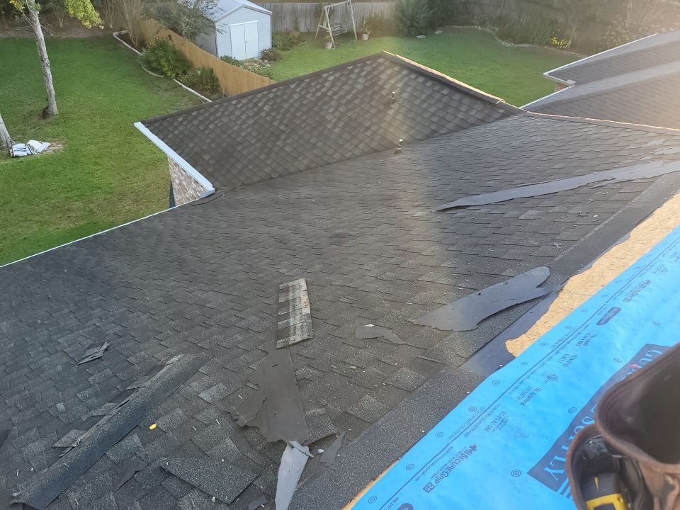 Residential Roofing Installation using Roof Replacement by American Roofing & Construction LLC