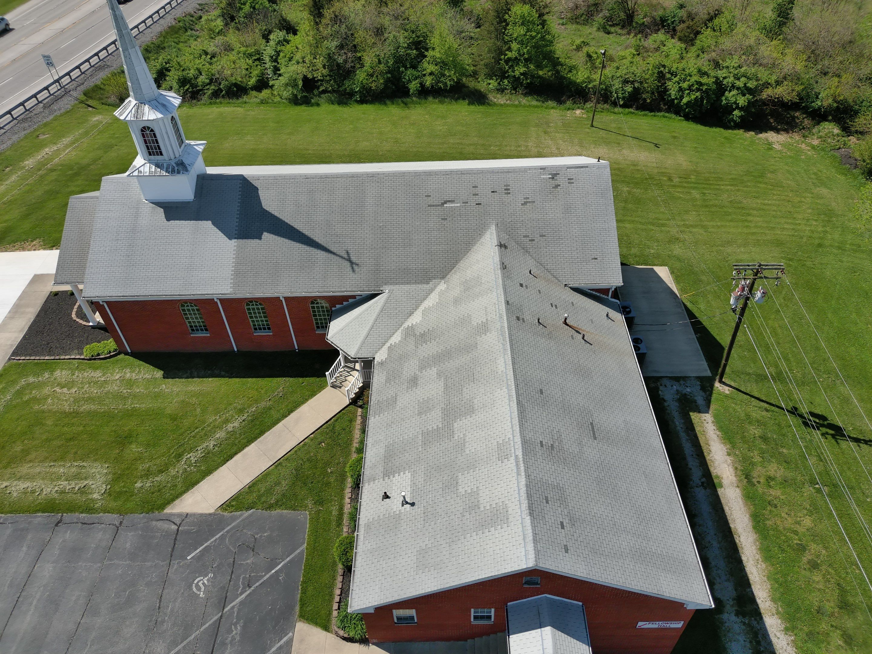 Commercial Roofing Installation using Performance Shingles by Mr. Roofer