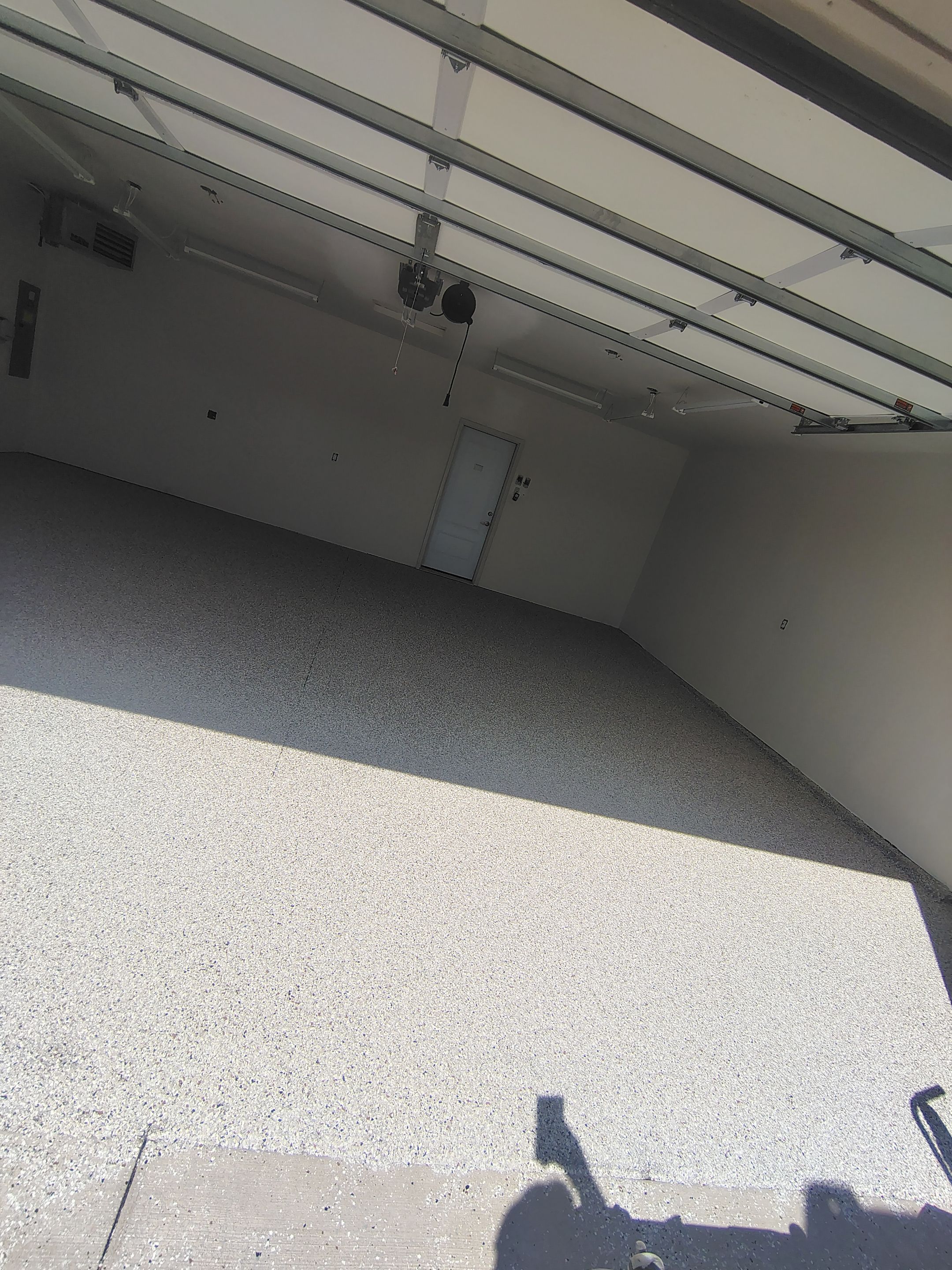 Garage Floor Coating with Coyote Decorative Chip in Tea by Select Painting, Coatings & Garage Cabinets