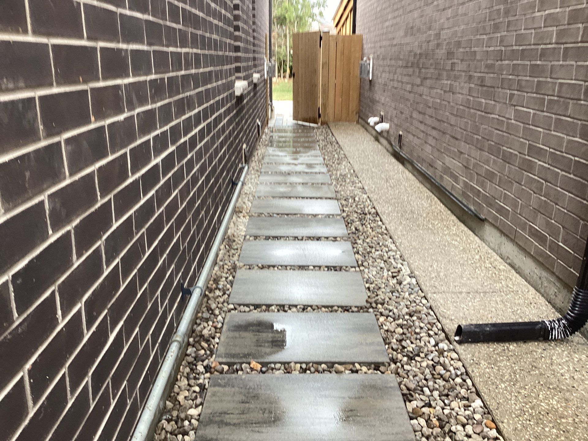 Front Entrance & Lounge Patio by Soares Landscaping