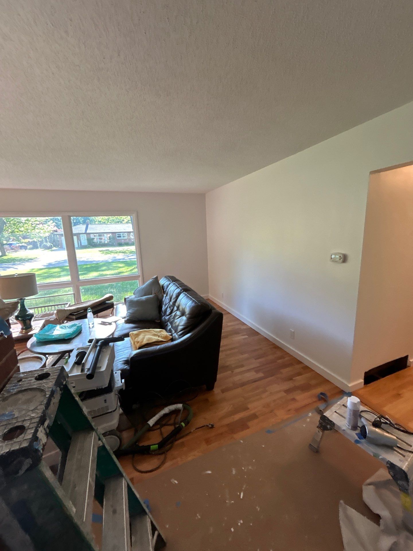 Repaint rooms, and Wallpaper install. by Gordon Painting