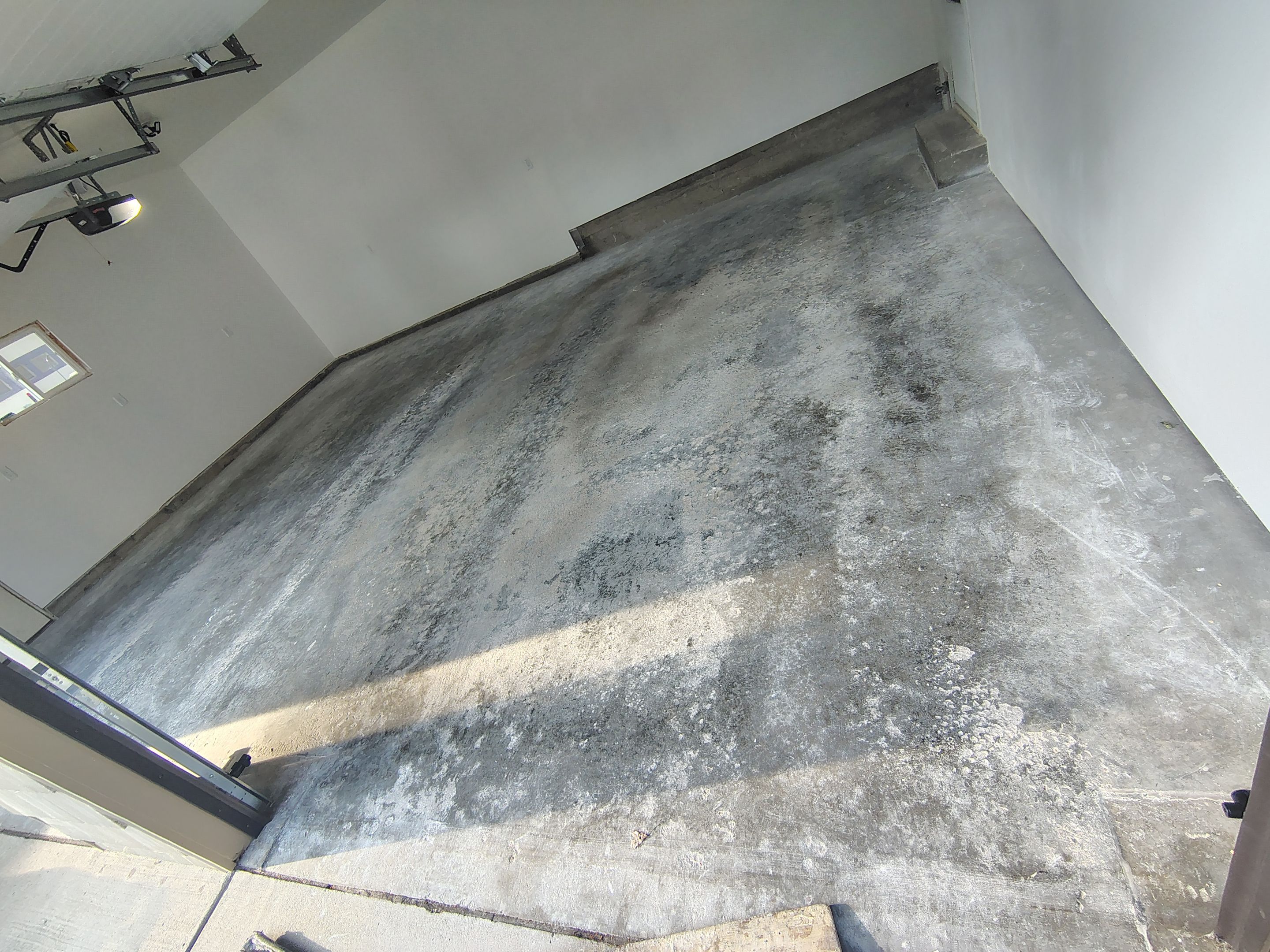 Epoxy Concrete Coating and Garage Floor Restoration in Sioux Falls by Select Painting, Coatings & Garage Cabinets