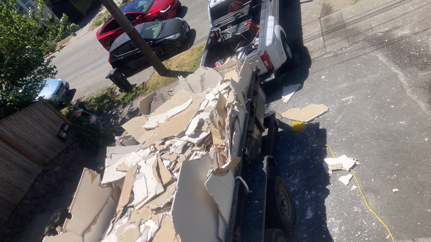 Roof tear-off and interior strip-out by Sledge Seattle
