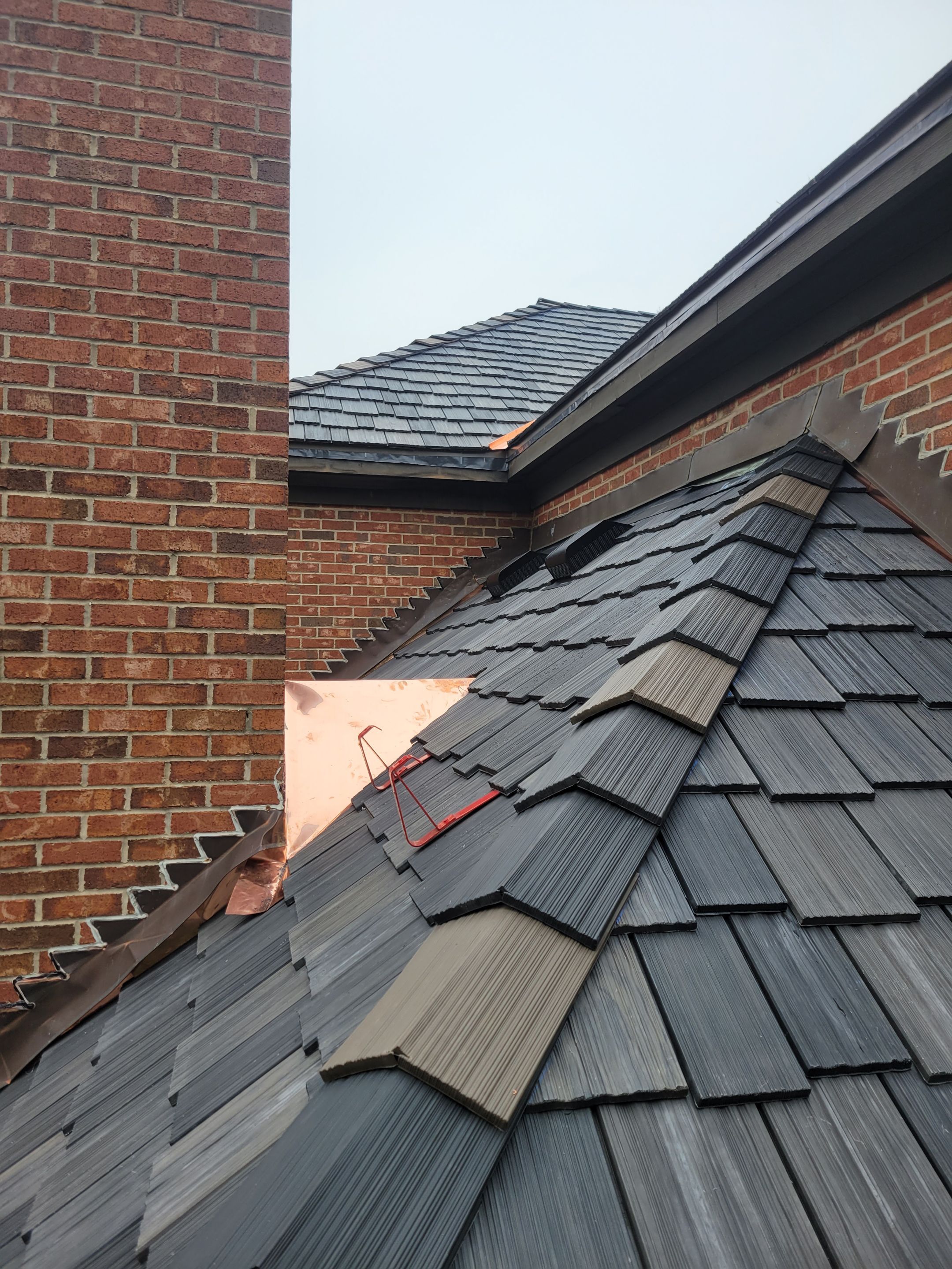 DaVinci Slate Installation with Copper Valleys by Custom Installations