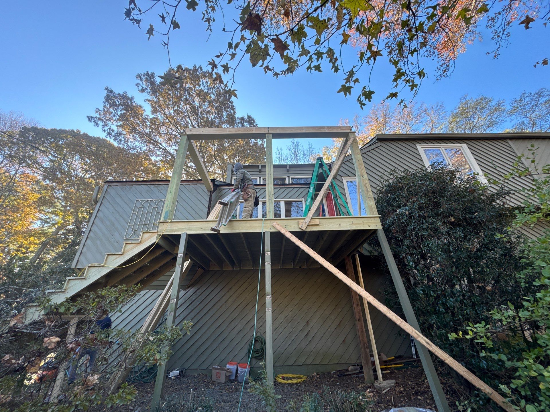 Elevated Wood Deck and Siding Replacement in Marietta by Swift Home Renovations