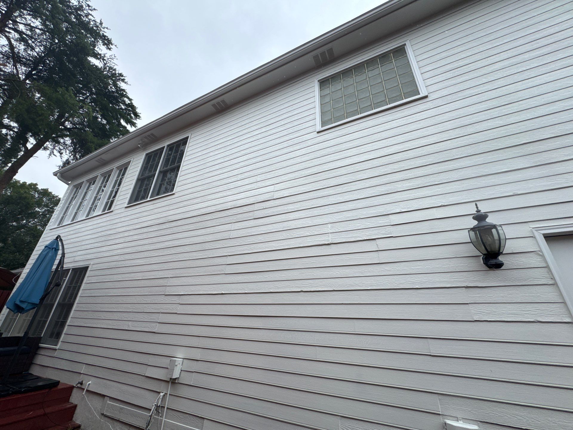 Exterior Siding and Trim Painting for Atlanta Two-Story Home by Swift Home Renovations