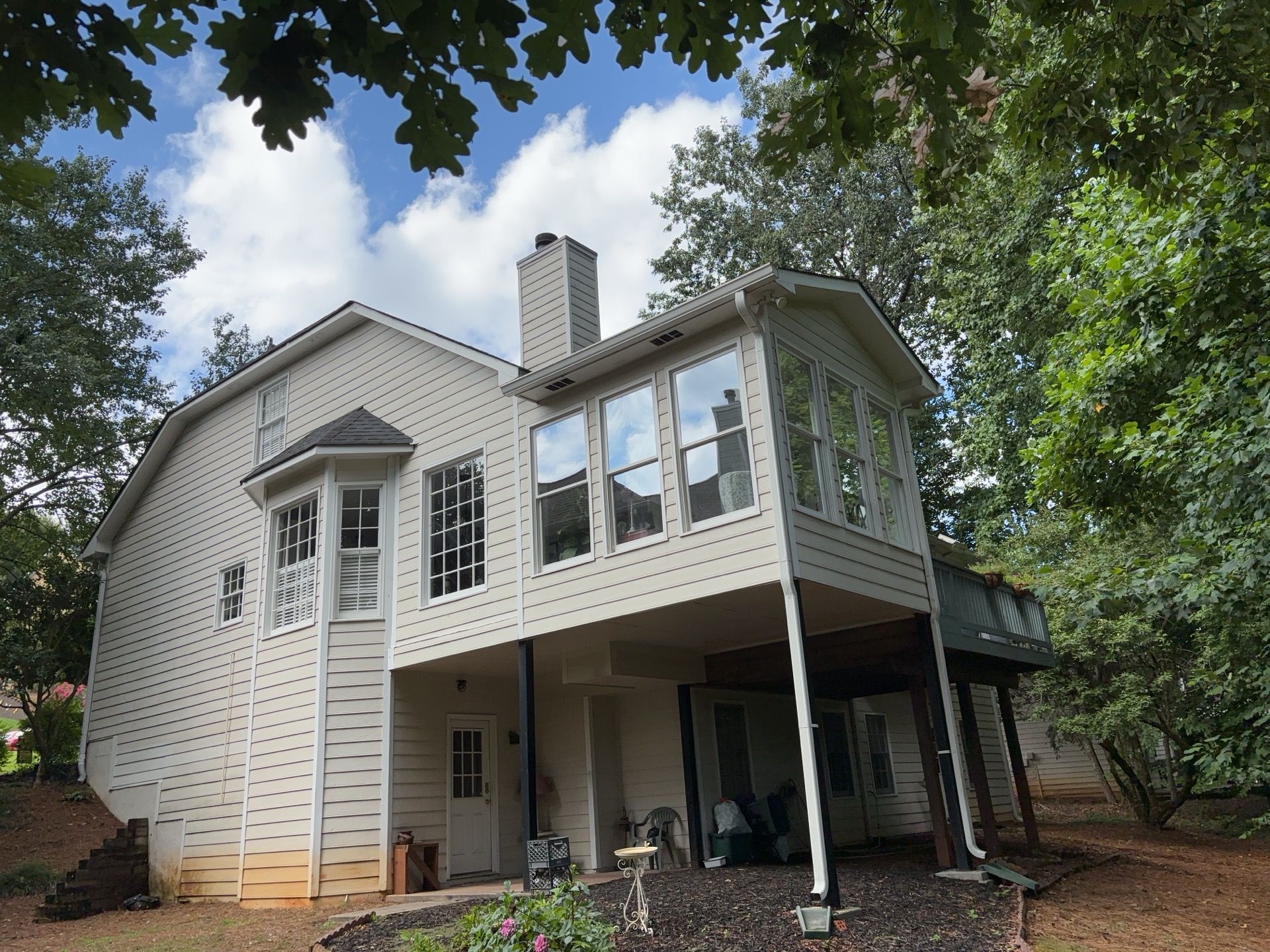 Blue Exterior Paint and Siding Installation using James Hardie Lap Siding by Nelson Exteriors