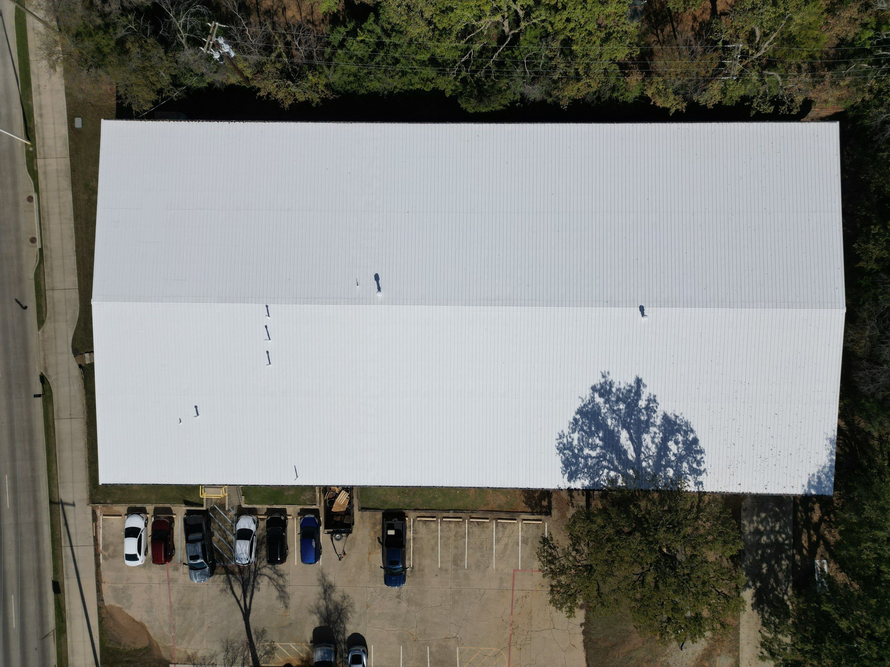 Silicone Coating Metal Rehab by First Out Roofing 