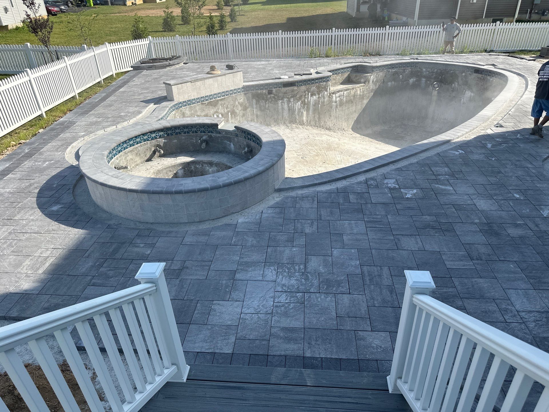 Pool and Hardscape Design in Delaware | Belgard Paver Patio & Outdoor Living Space by Studio G Indoor Spaces & Outdoor Living