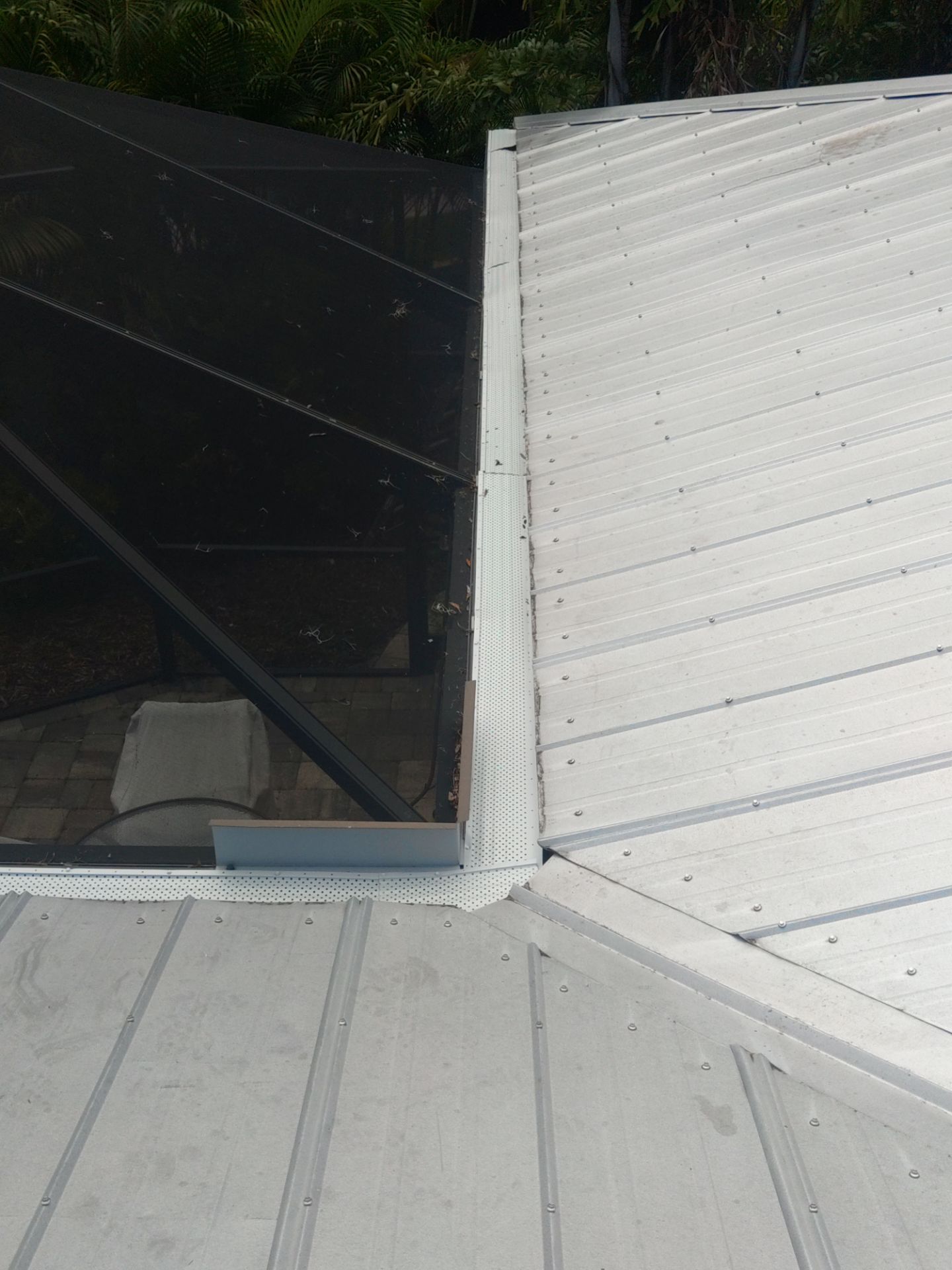 Gutter guards installation combined with gutter cleaning in Sarasota, FL by Gutter Professors