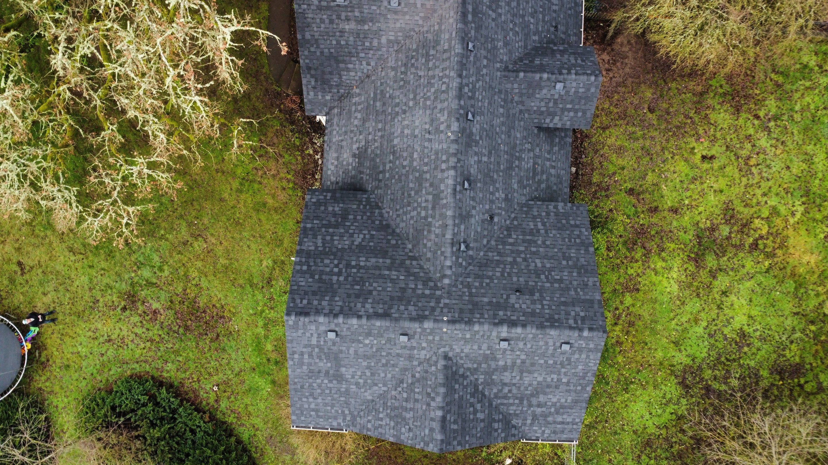 Residential Roofing Installation using IKO Dynasty (Color: Granite Black) by Orezona Building & Roofing Company, Inc.