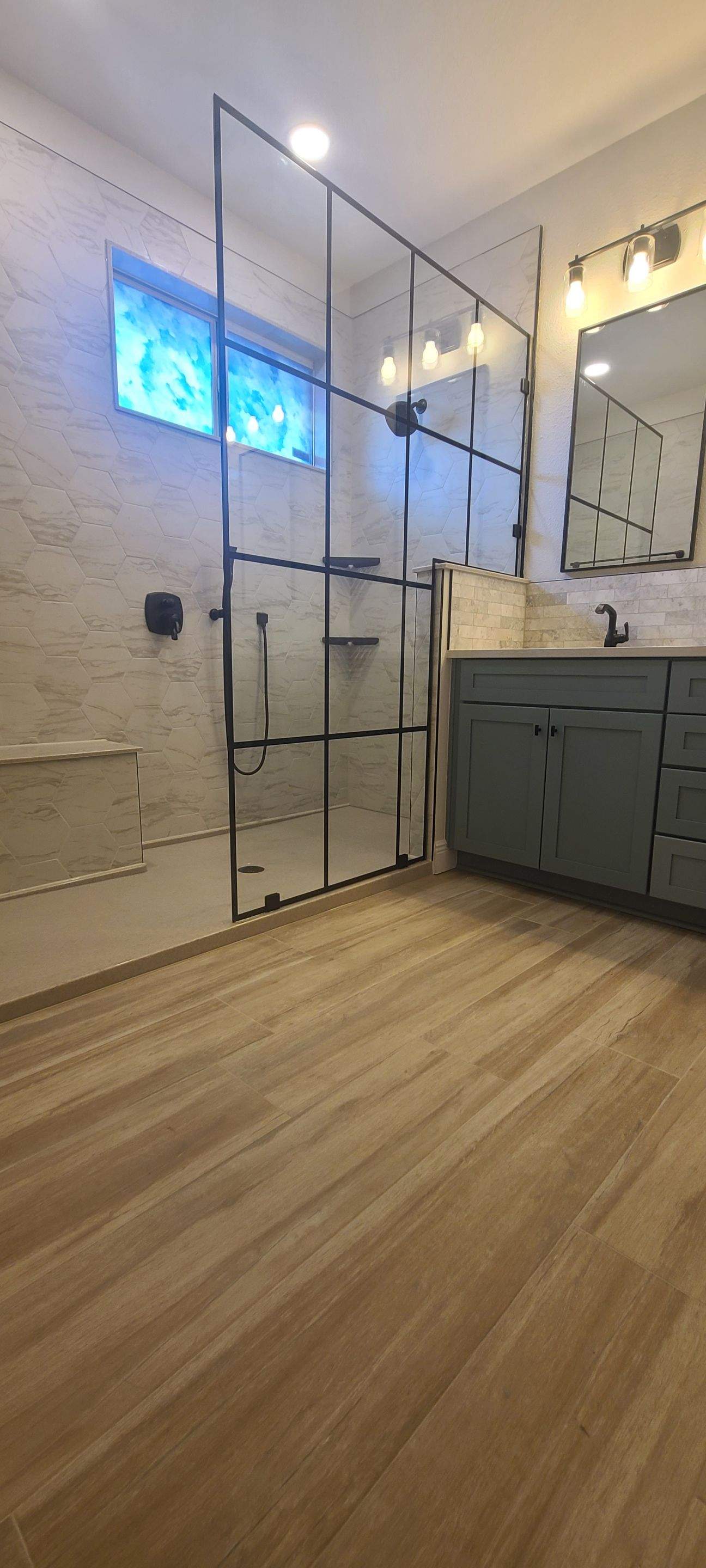 Stone Oak Bathroom Remodel with Paned Shower Glass by Legacy Bath and Kitchen