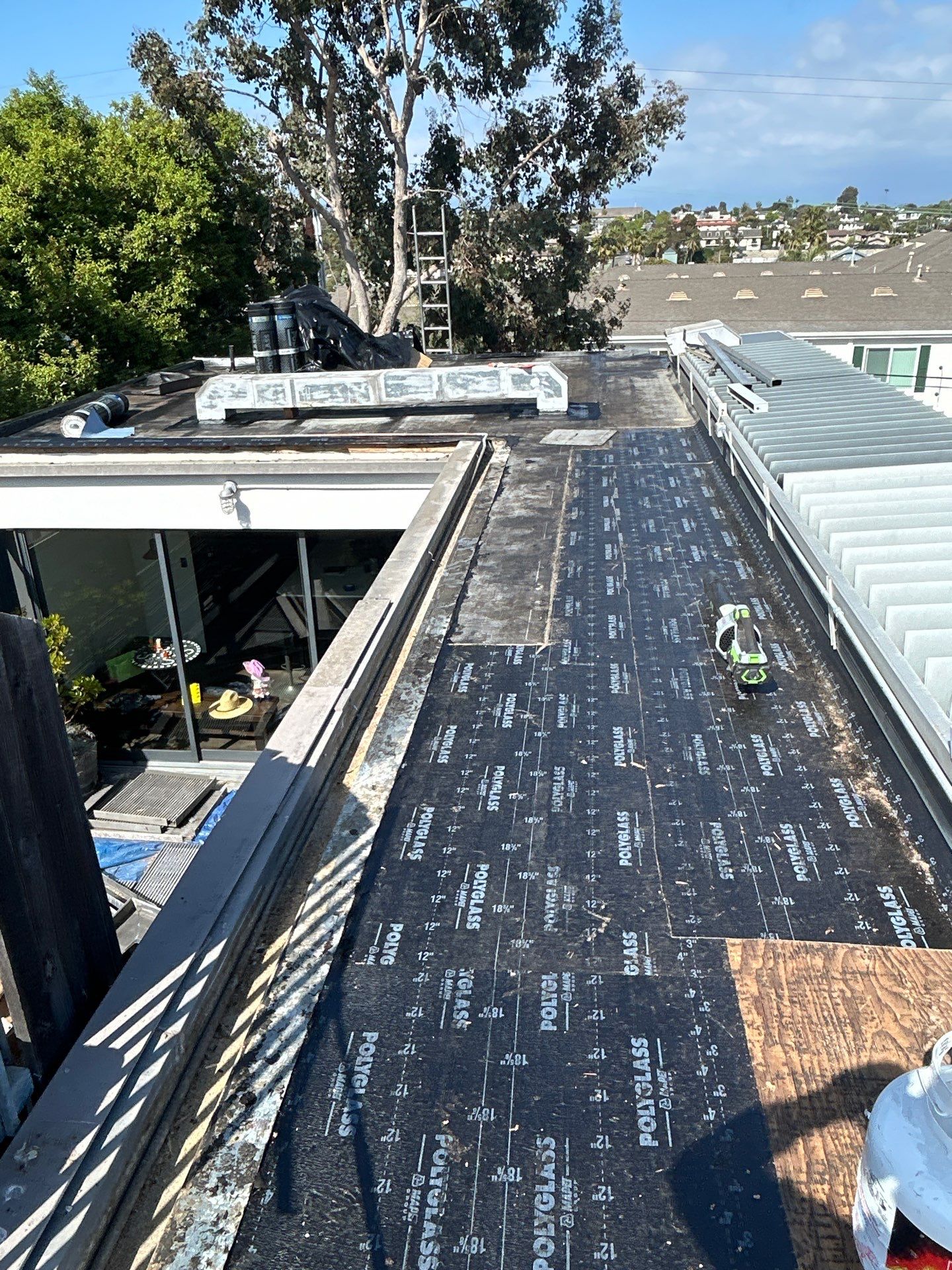 Residential Roofing Installation using Polyglass Torch Down Roofing System by Hull Brothers Roofing