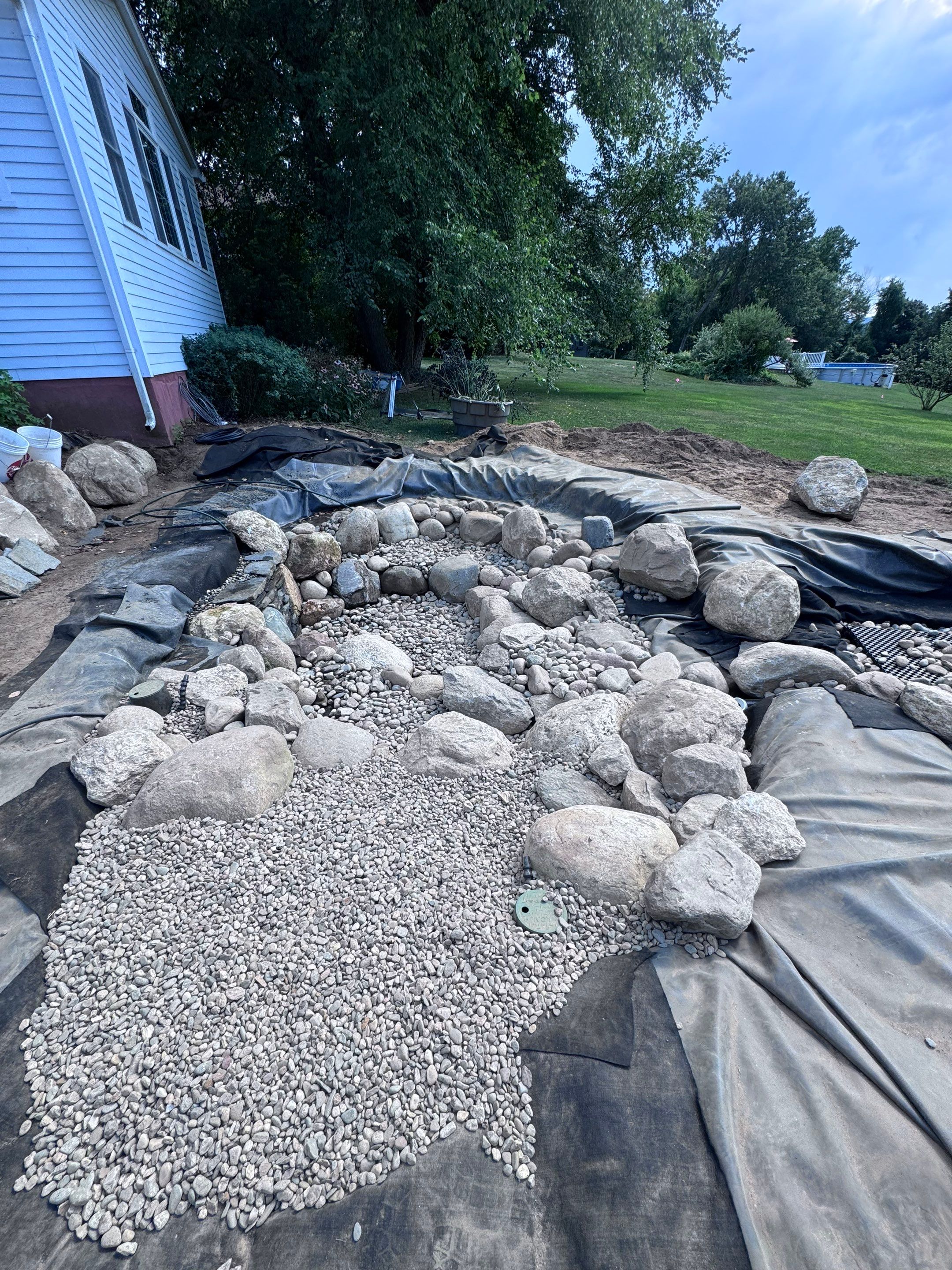 NEW 13’x18’x3' koi pond with 8' waterfall and lots of extra features by Wicked Water Gardens