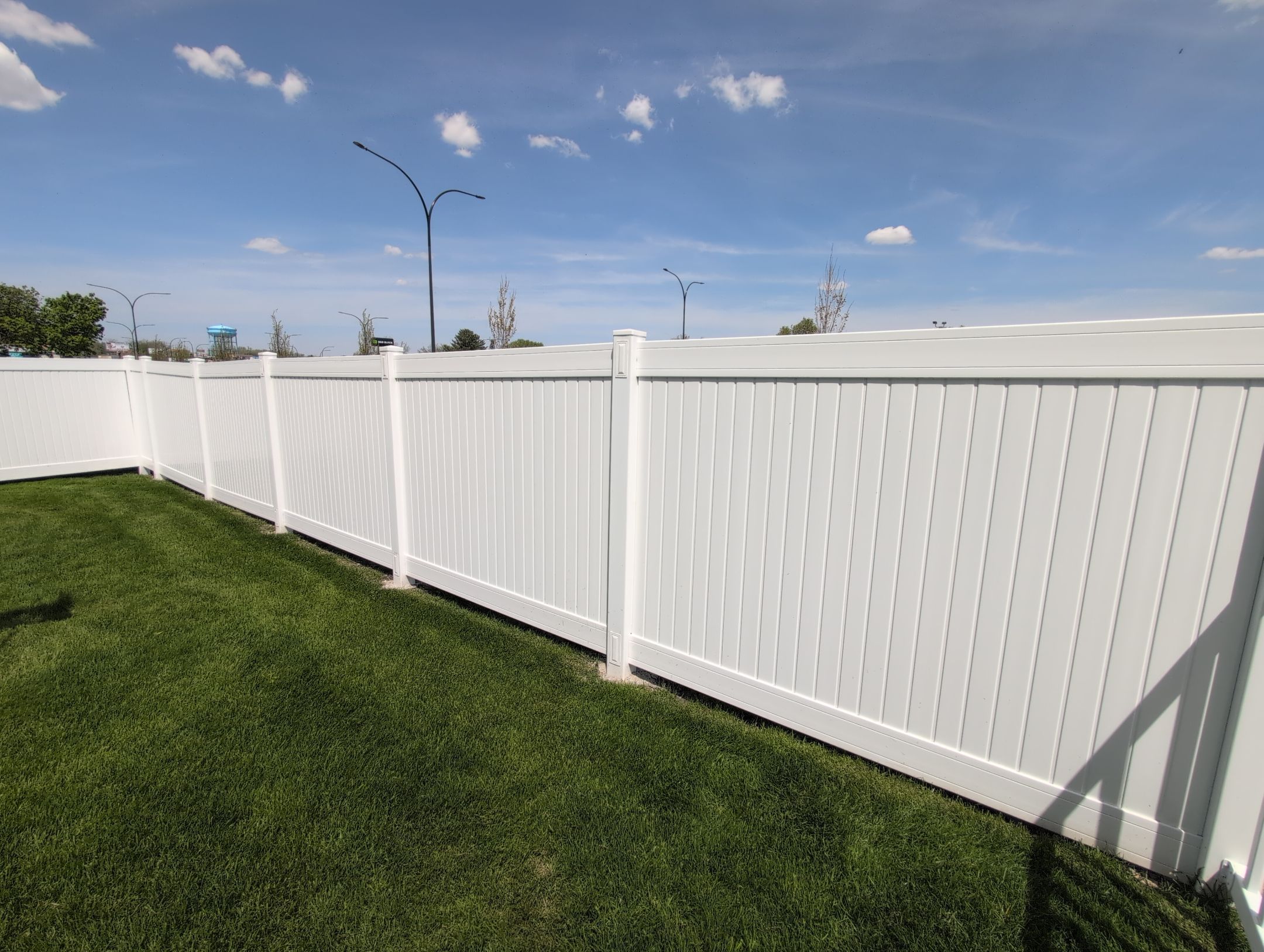 White Vinyl Privacy and Picket Fence Installation in Waterloo by Perfect Picket Fence and Stain