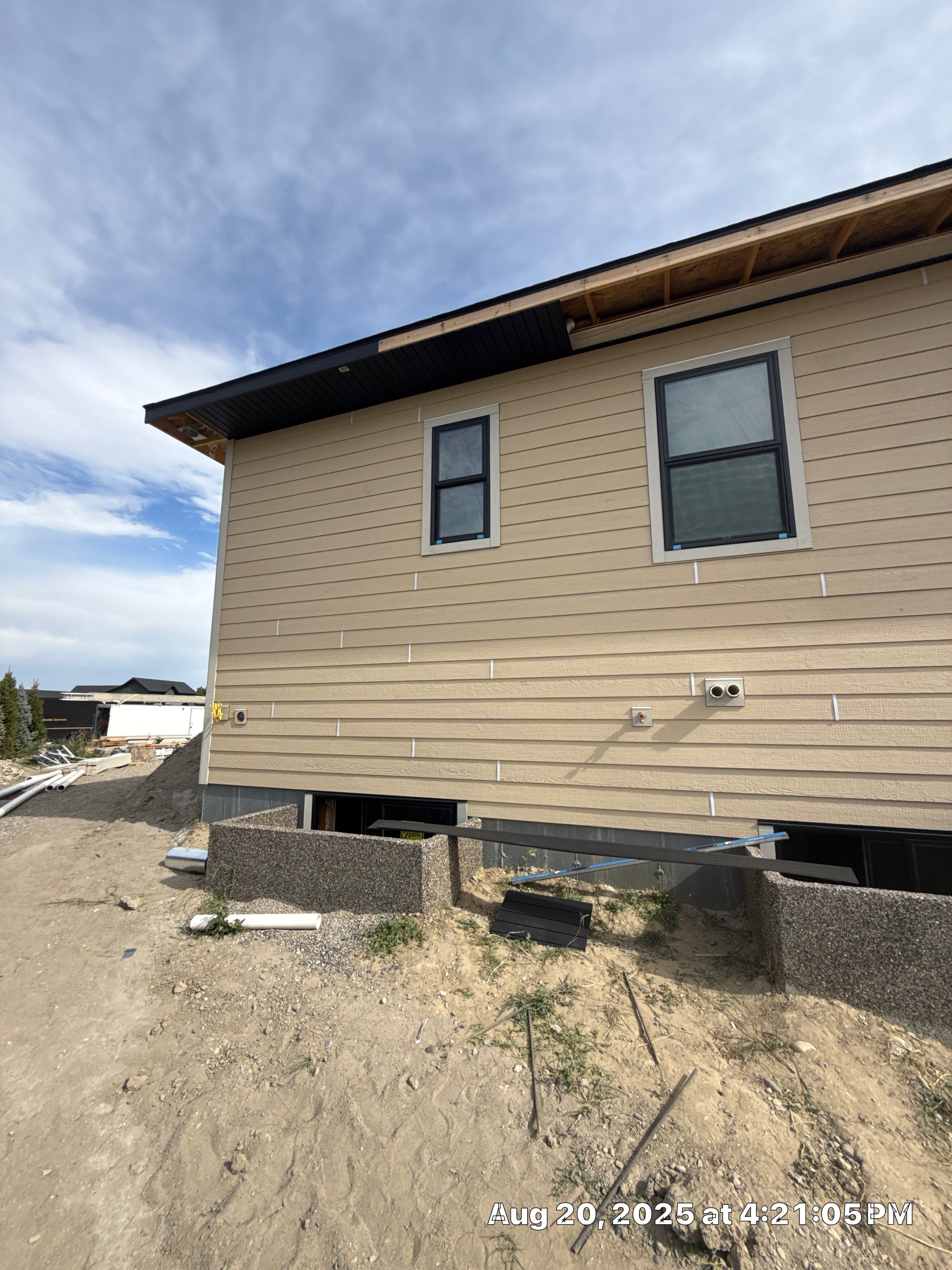 New Construction LP Smartside by Plankwalker Siding & Roofing