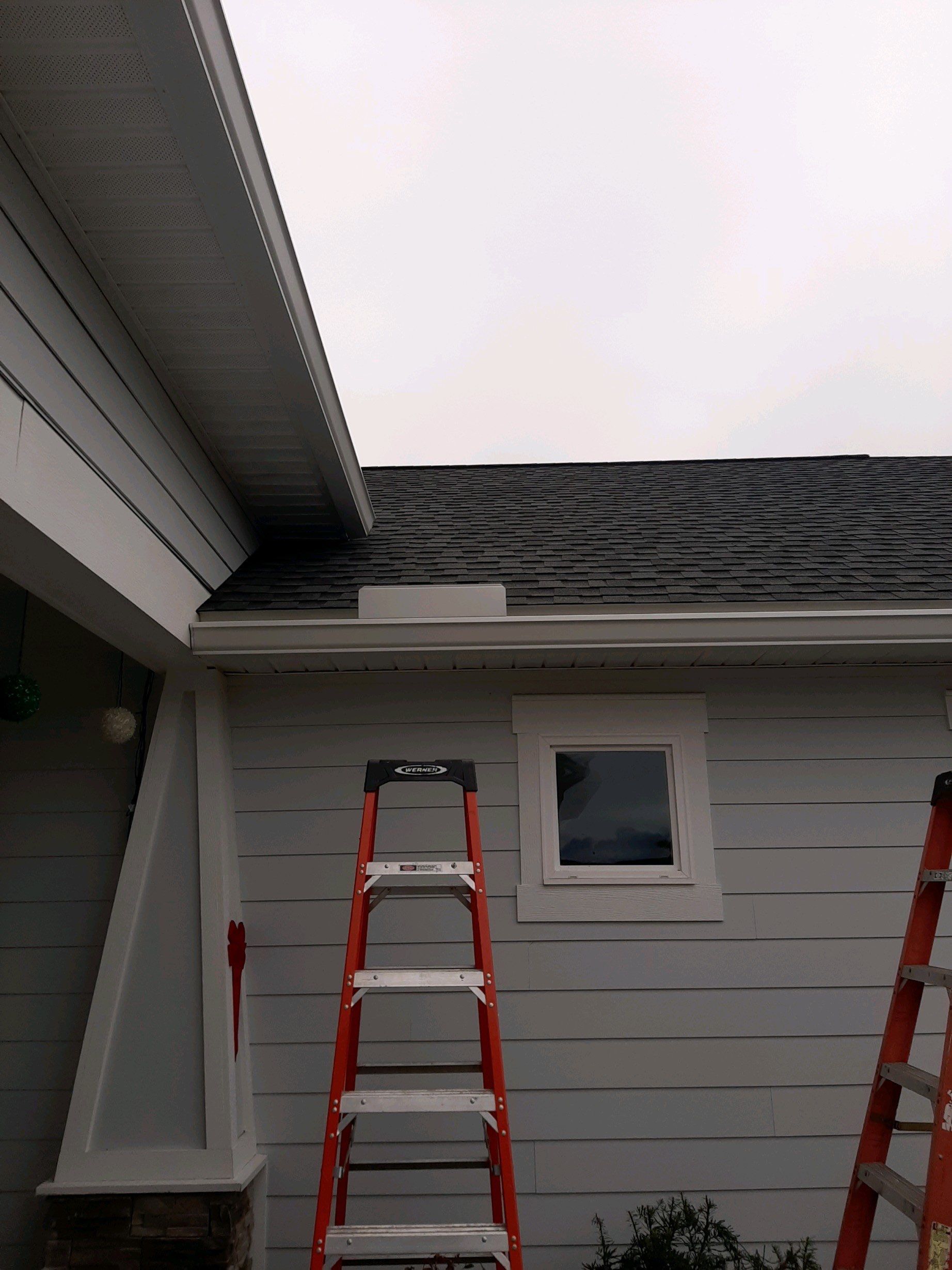 Gutter Installation using White K-Style Seamless Gutters by Gutter Professors