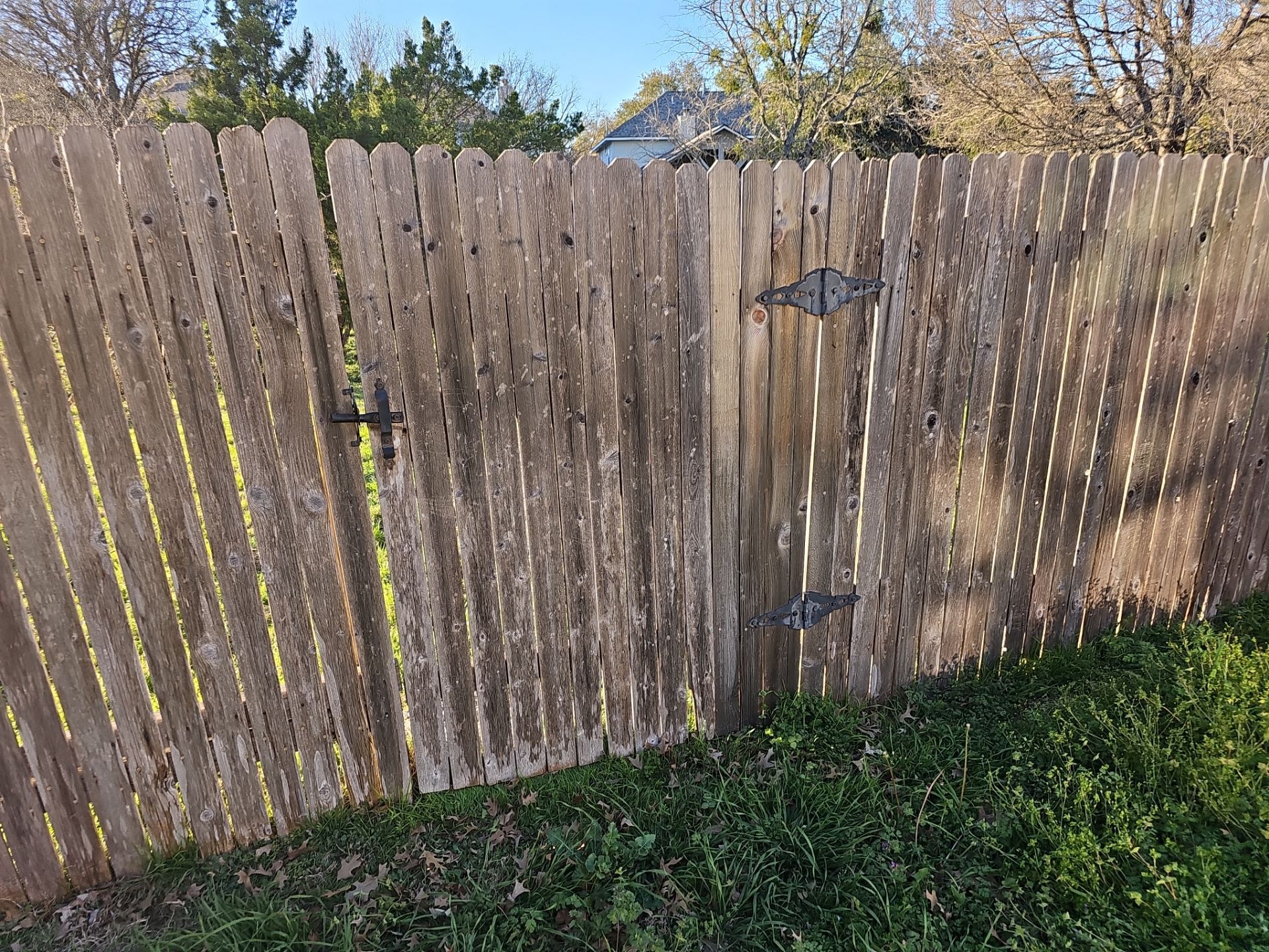 Fence Installation using Cedar Pickets by DeZign Roofing & Exteriors