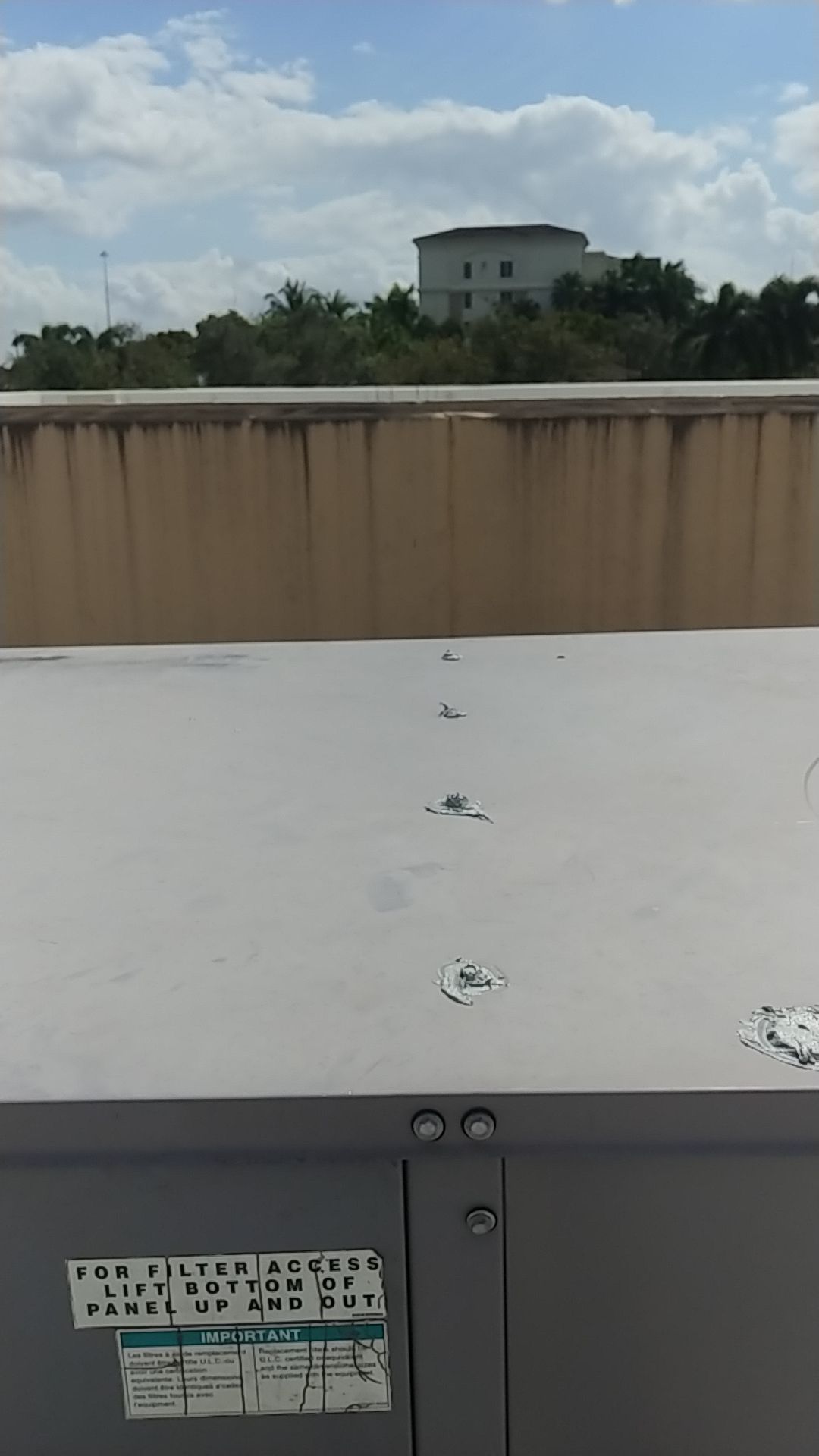 Commercial Roofing Repair using Silicone Coating by Aastro Roofing
