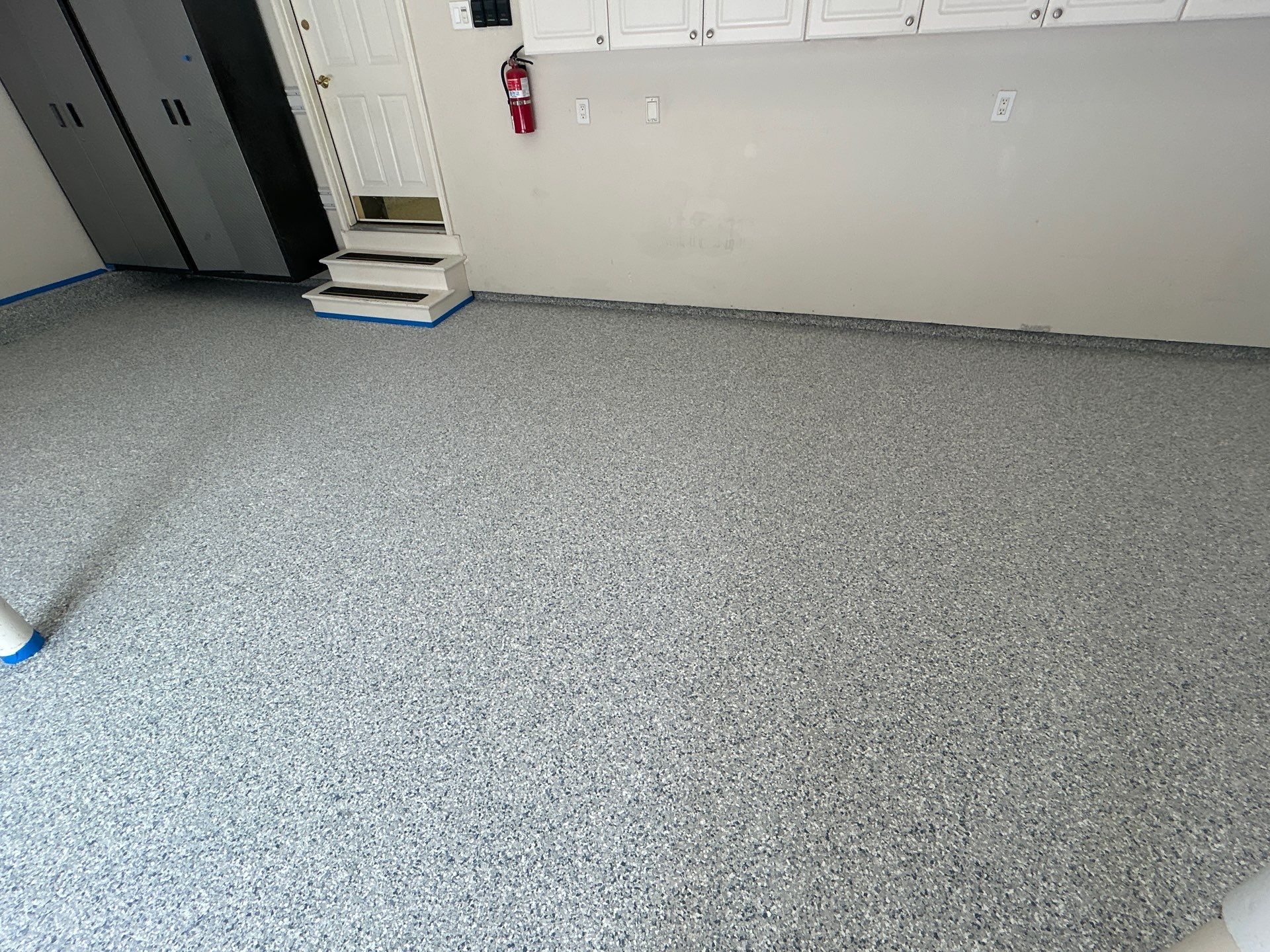 Concrete Floor Coating Transformation by DiGiorgi Roofing and Siding Inc