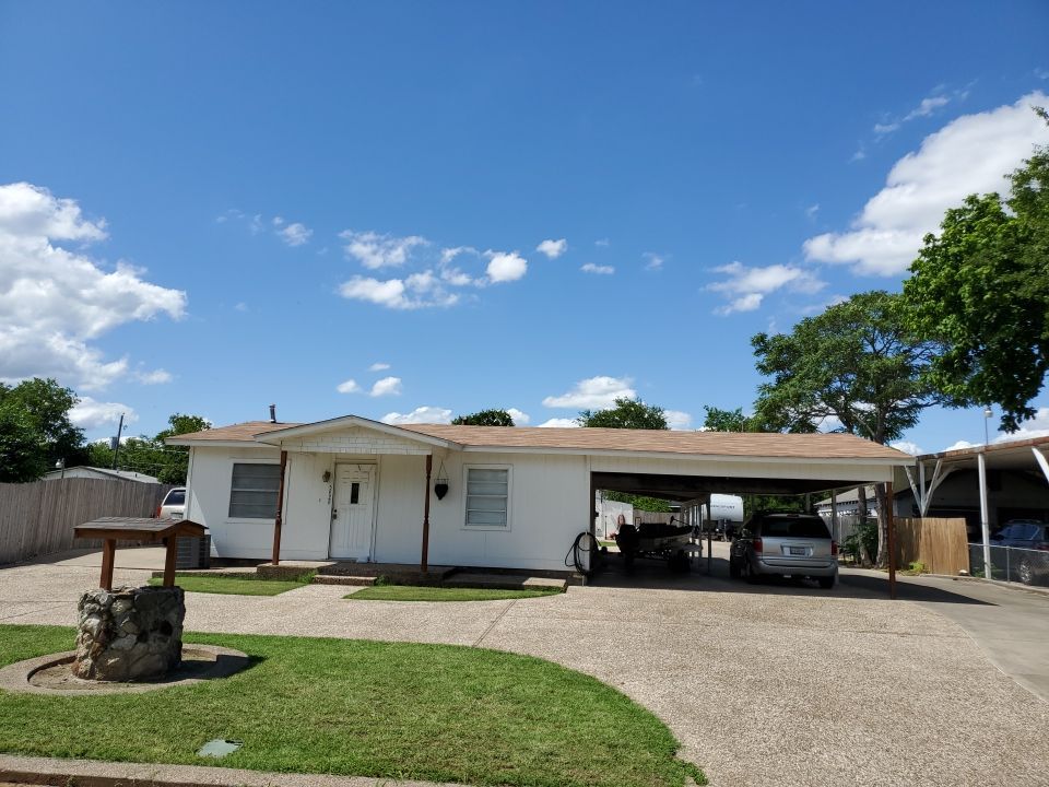 Residential Roofing Installation using Roofing Shingles by Harvey Roofing & Construction