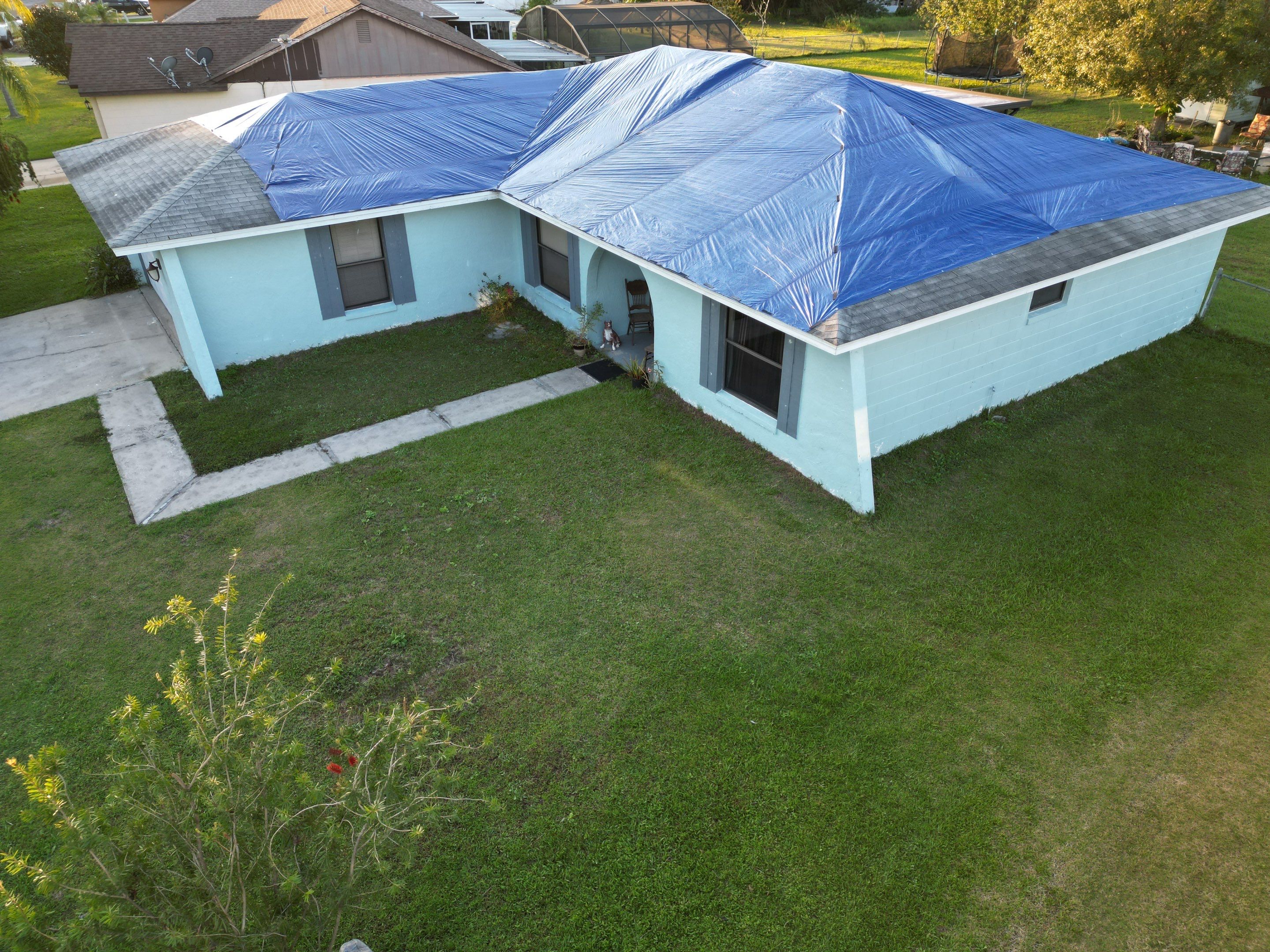 Tarp using TARP BLUE by AquaShield Restoration USA