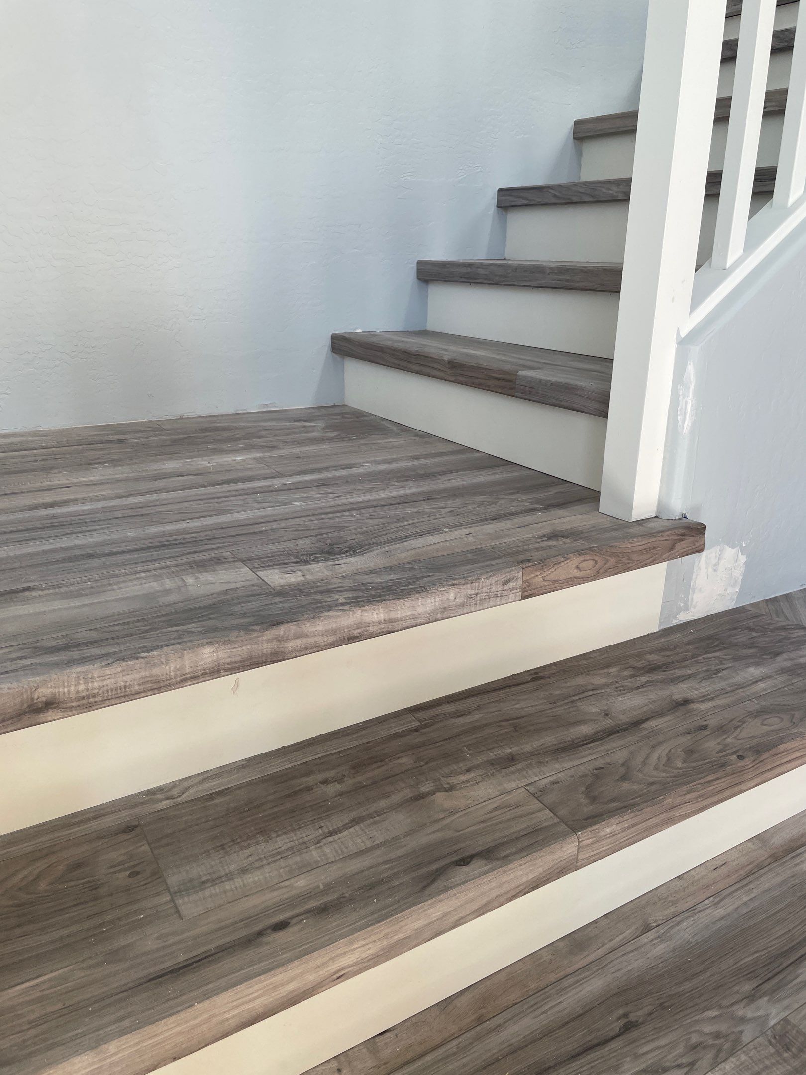 Laminate Staircase and Flooring  by Footprints Floors of Chandler 