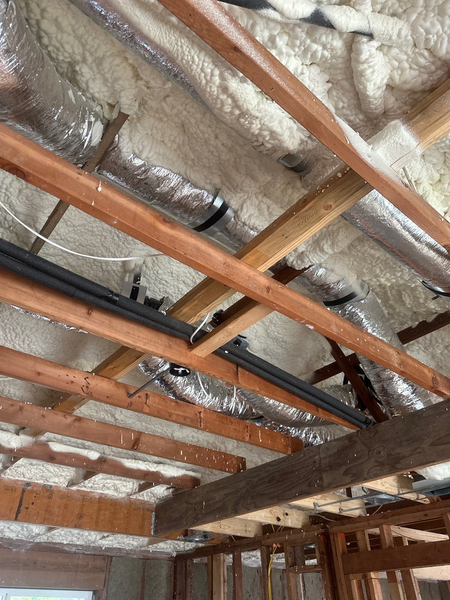 Open cell spray foam & rockwool job completed in Dallas TX by Apex Insulation Solutions