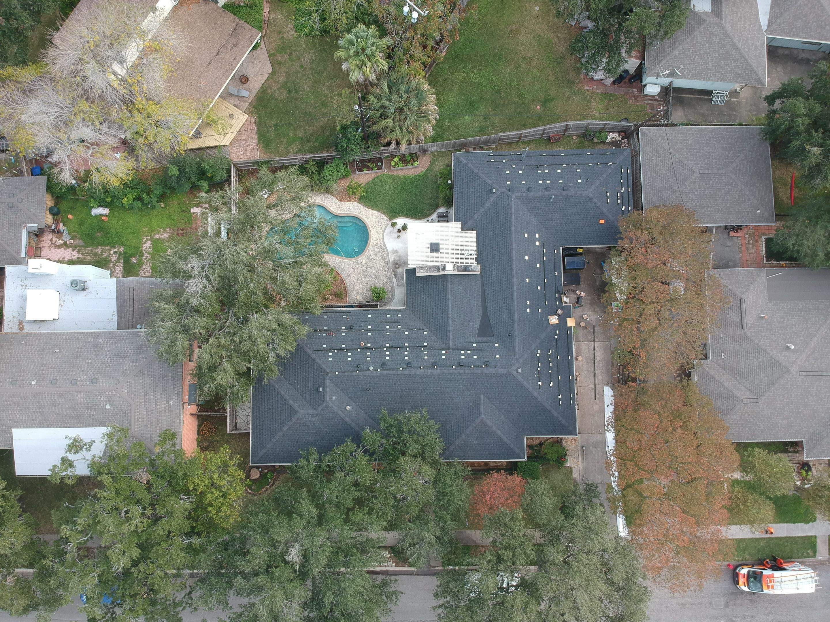 Residential Roofing Installation using Certainteed Landmark Moire Black by Galvan Roofing and Construction