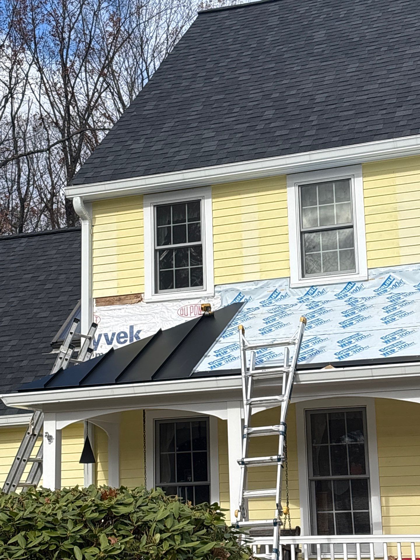 Chelmsford Premium Roof: Onyx Black Shingles with Standing Seam Metal Porch by Mighty Dog Roofing of Greater Middlesex County