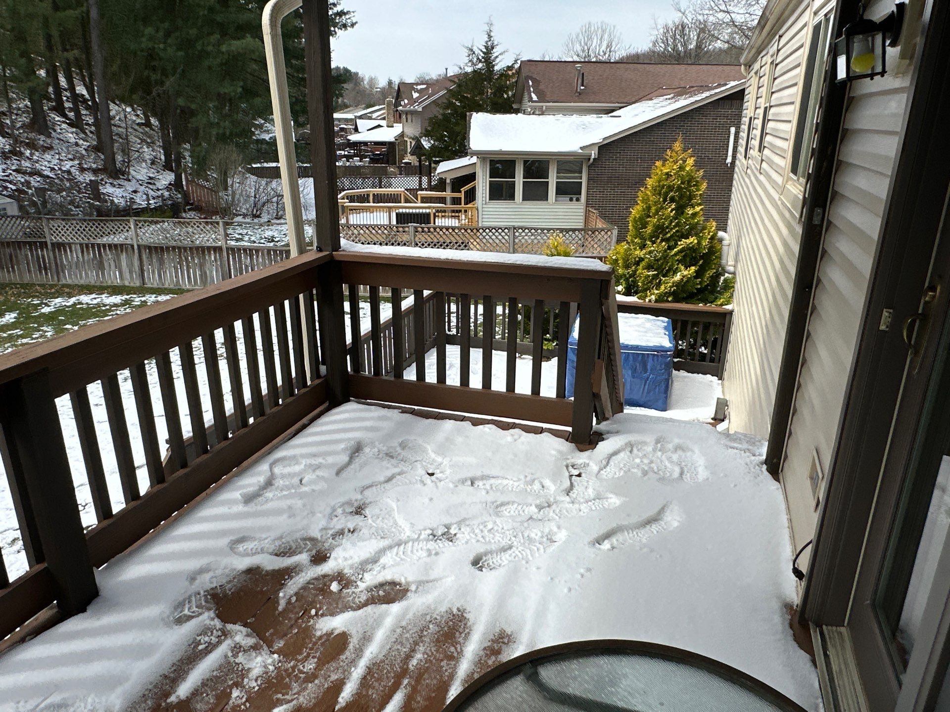 Elevated Composite Deck Installation with Covered Porch in South Park Township by Cousins Roofing Siding & Decks