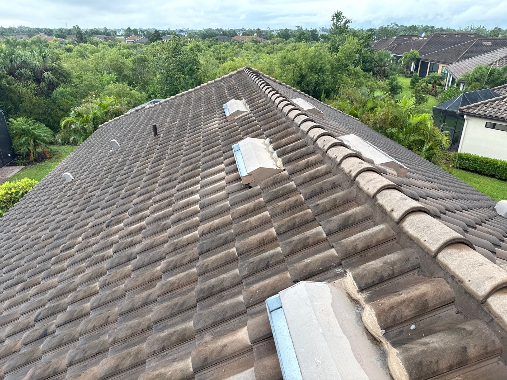Concrete Tile Roof, Paver Driveway & Lanai Cleaning – Artisan Lakes Esplanade, Palmetto, FL by Sunshine AquaWash