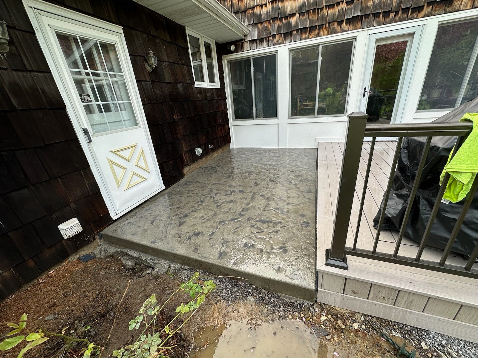 Deck and Stamped Concrete by Ivy Lea Construction