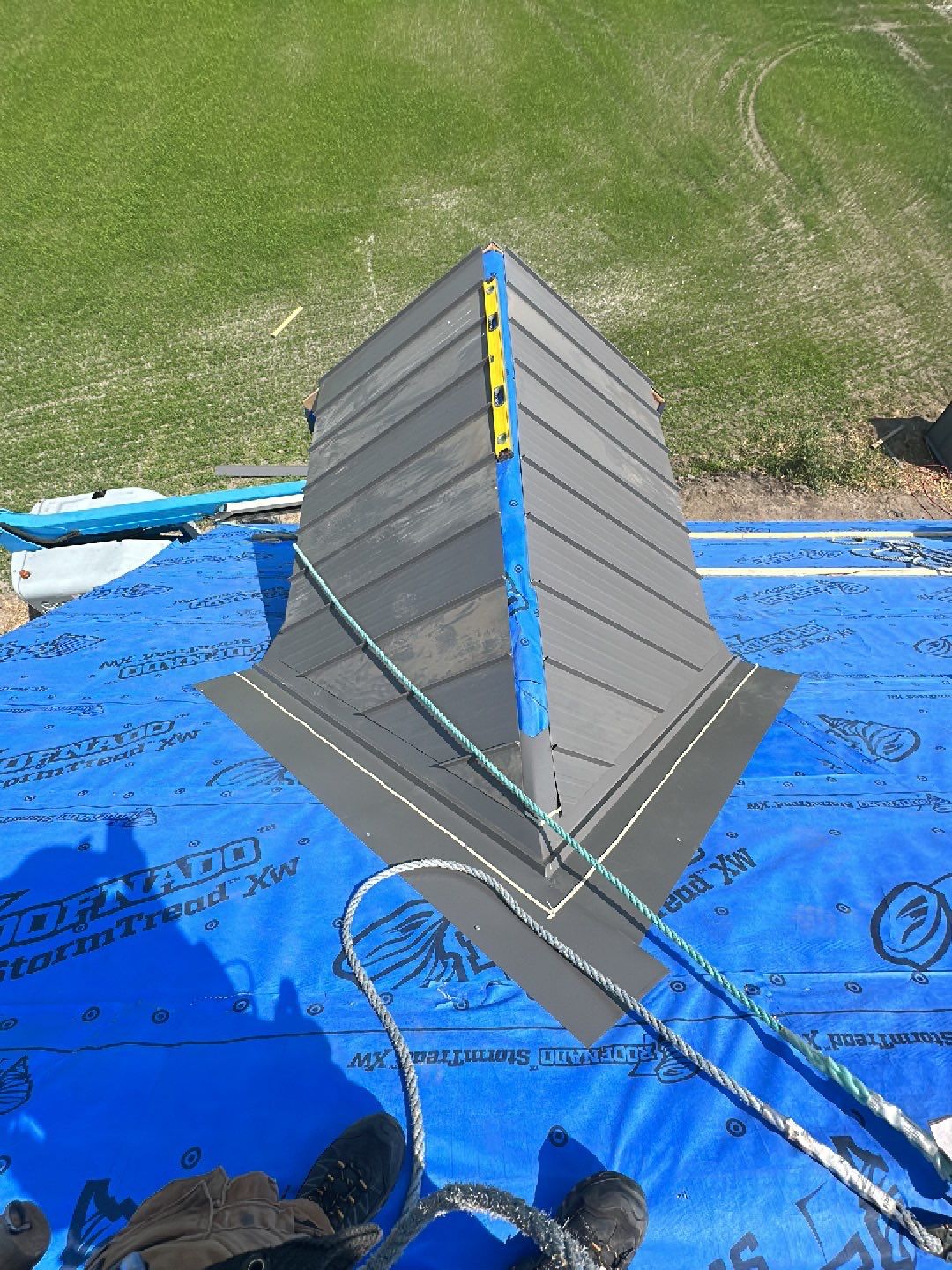 Agricultural Roofing Installation using 12" Prolok metal  by Top Notch Roofing Inc