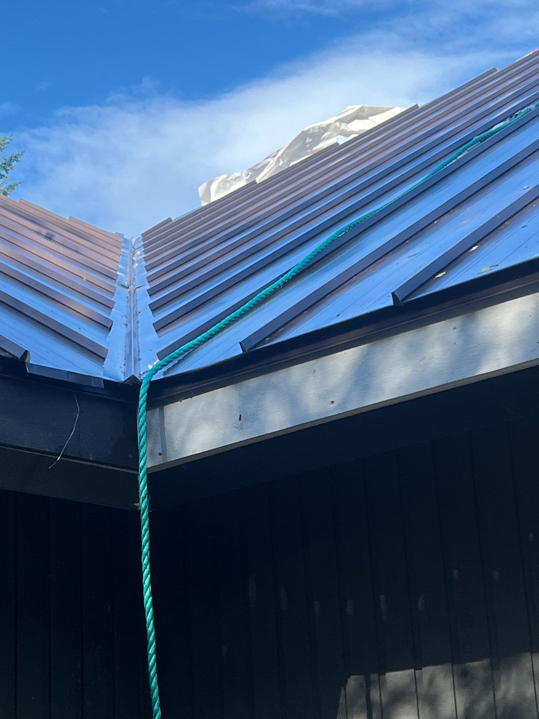 North Bend Roof Replacement using Standing Seam Metal - Dark Bronze by RoofSmart