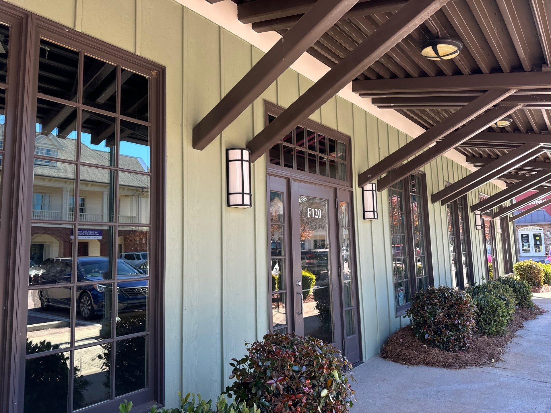 Commercial Exterior & Stairwell Painting – Corner Market by PGP Surface Solutions, LLC