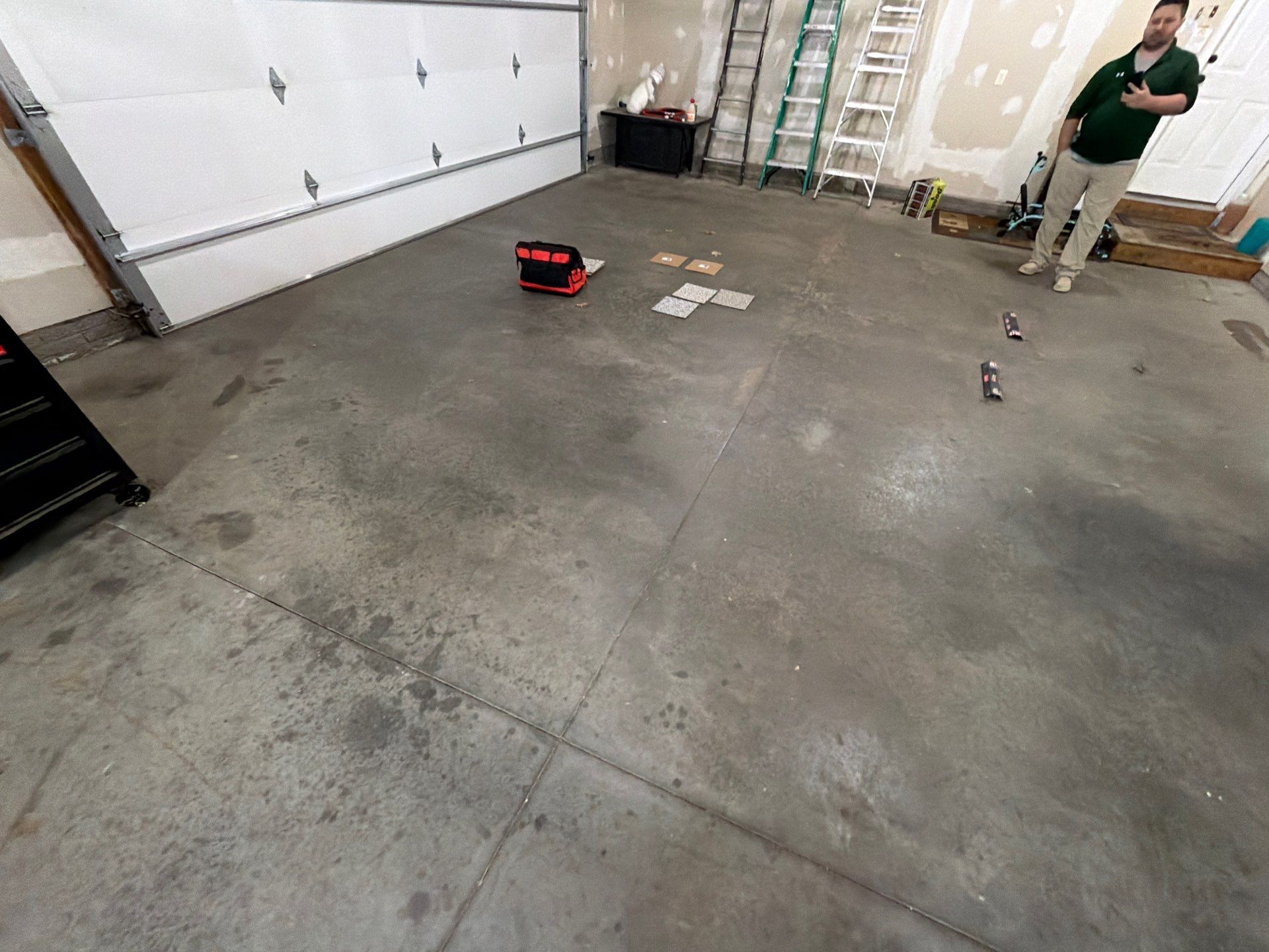 Tidal Wave Flake Garage Floor Installation in Sioux Falls by Select Painting, Coatings & Garage Cabinets