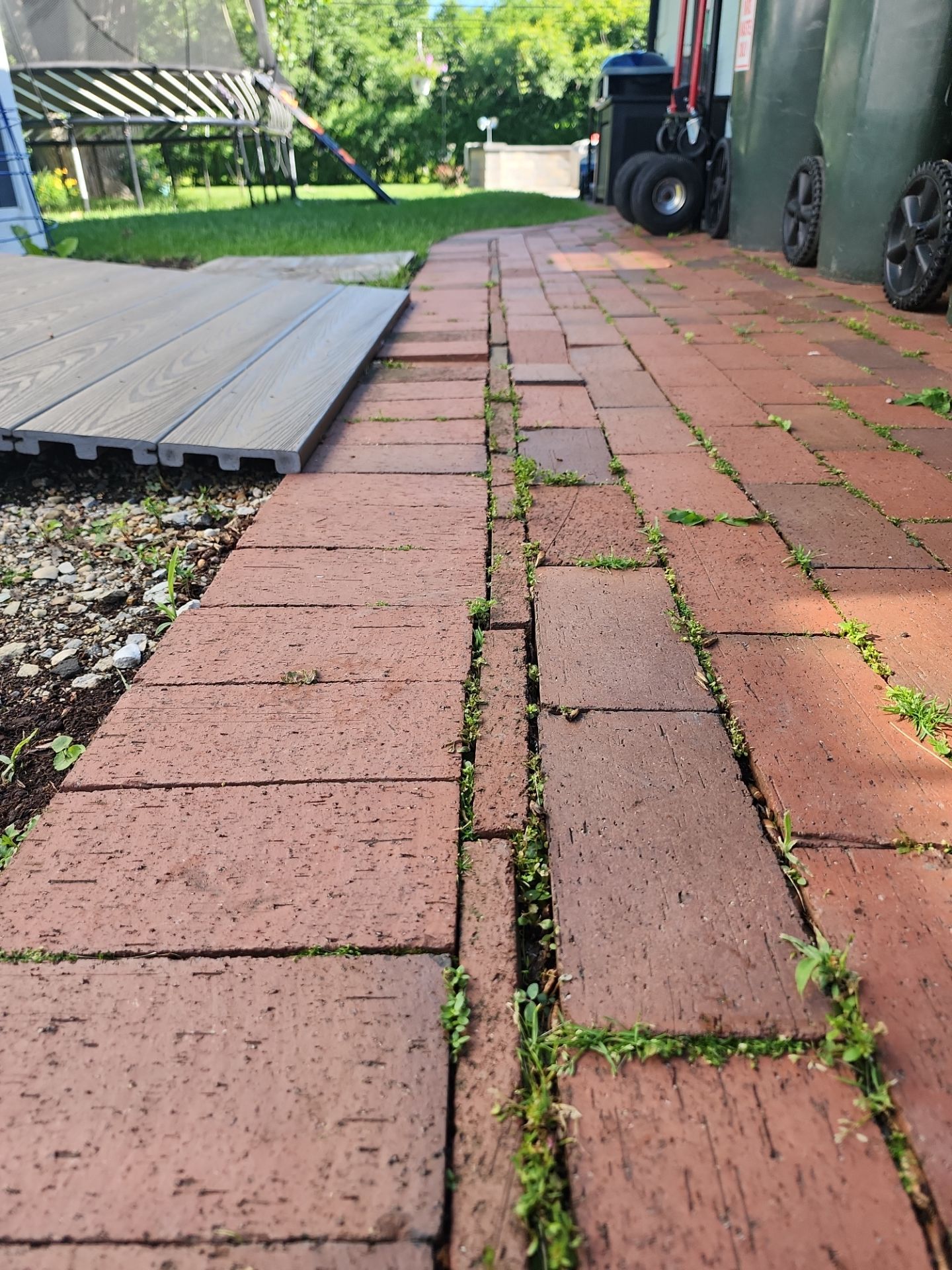 Brick paver repair, cleaning and sealing by Northern Power Washing LLC.