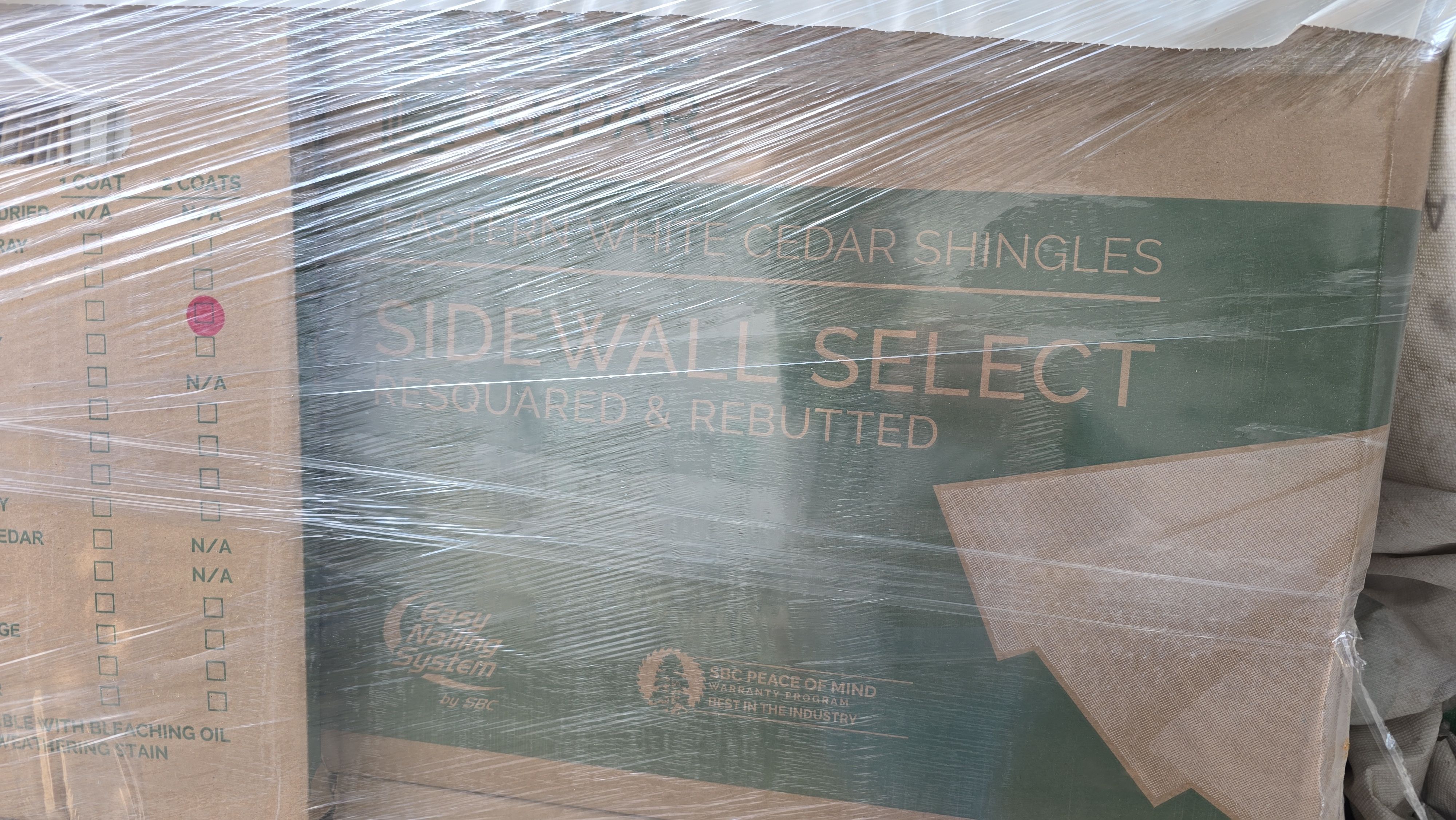 White cedar shingles and windows in Wayland, MA by UBrothers Construction