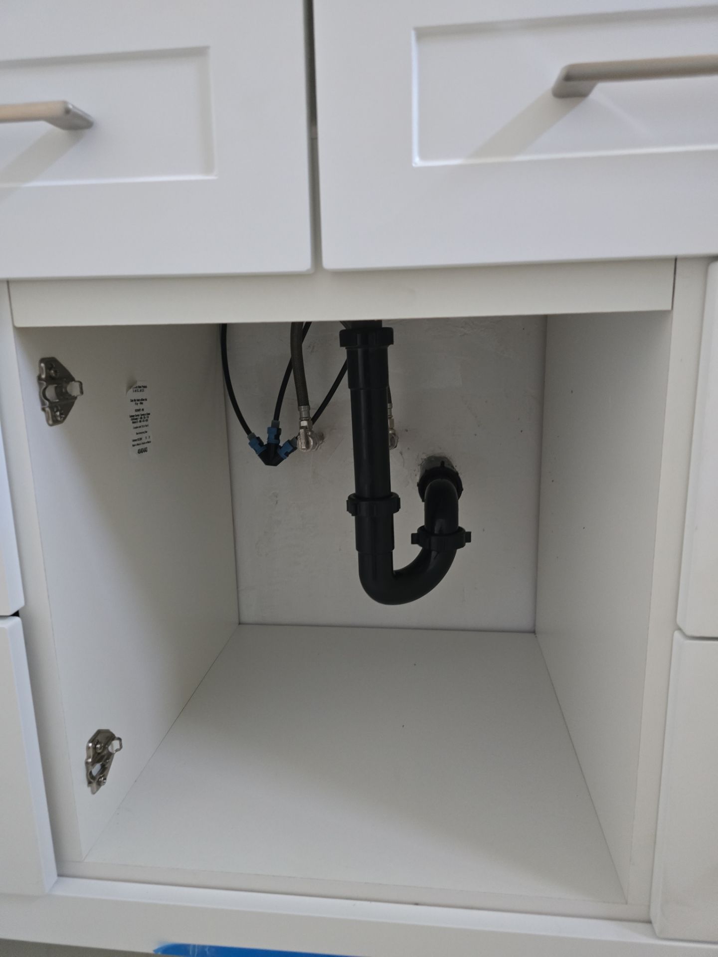 Installation of New Cap for Water Heater, Under-Sink Plumbing, and New Toilet by Us Plumbing