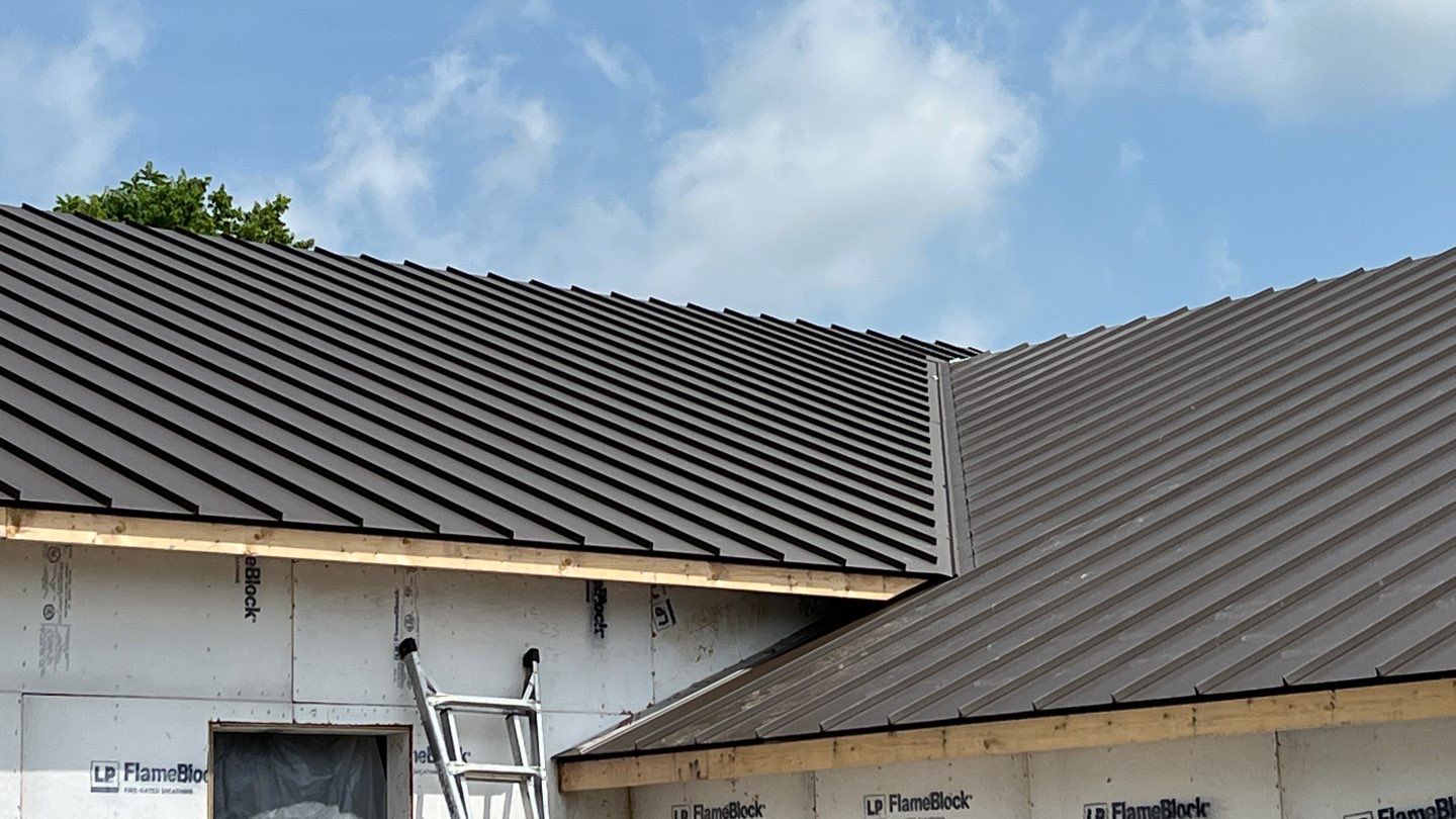 Commercial Roofing Installation using Standing Seam Metal - Burnished Slate Frost by RoofX 