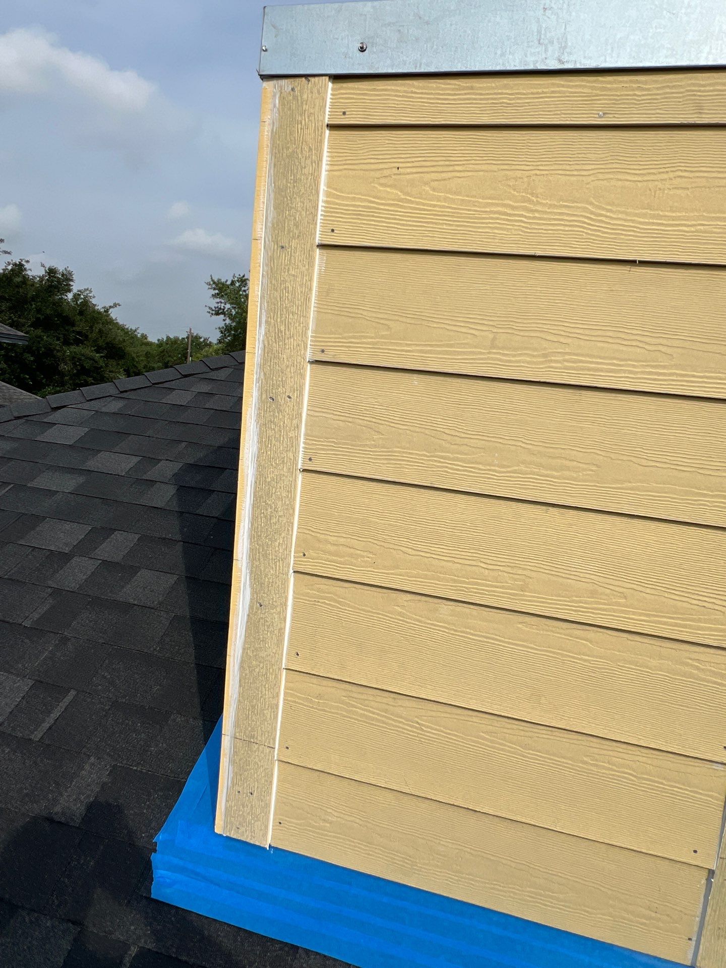 Nothing looks nicer than a little black roof by Bayfront Roofing and Construction