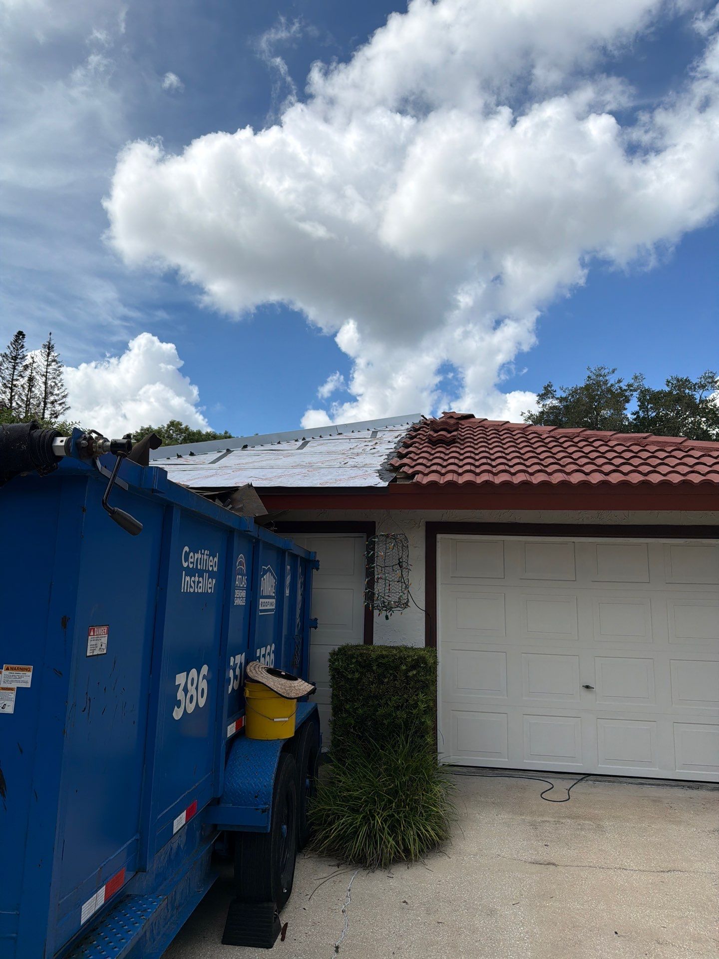 Residential Tile Roof Replacement and Gutter Installation in Winter Park by Pinnacle Roofing Group