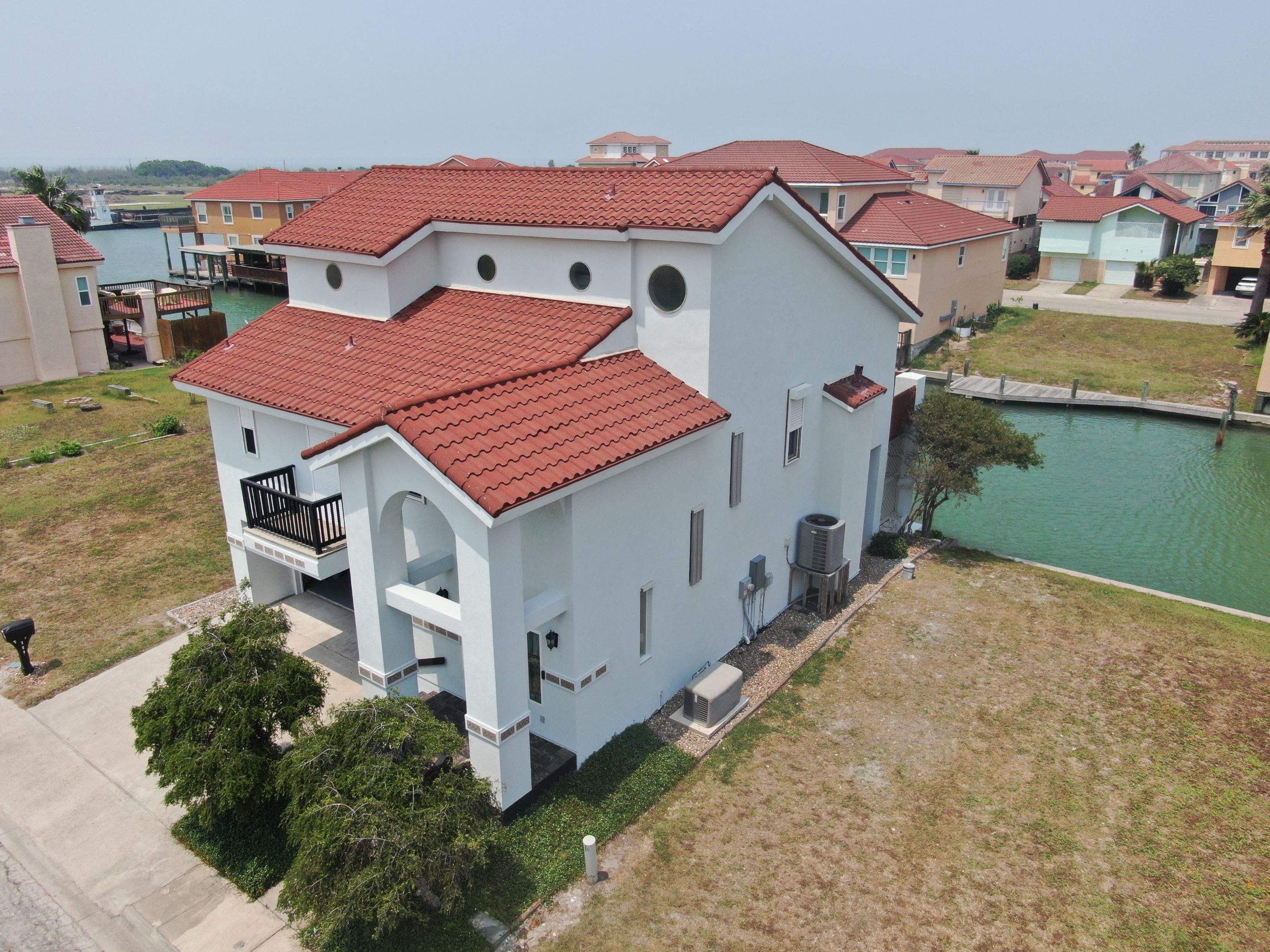 Waterfront Stucco Remastered by Bayfront Roofing and Construction
