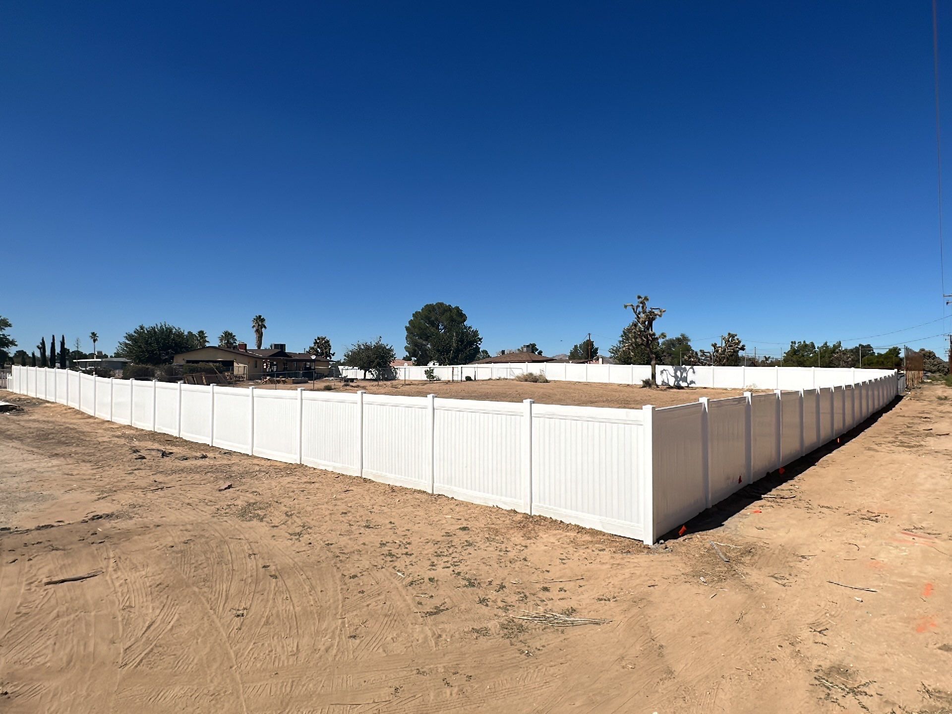 White picket fence  by Fence Guys Inc. 