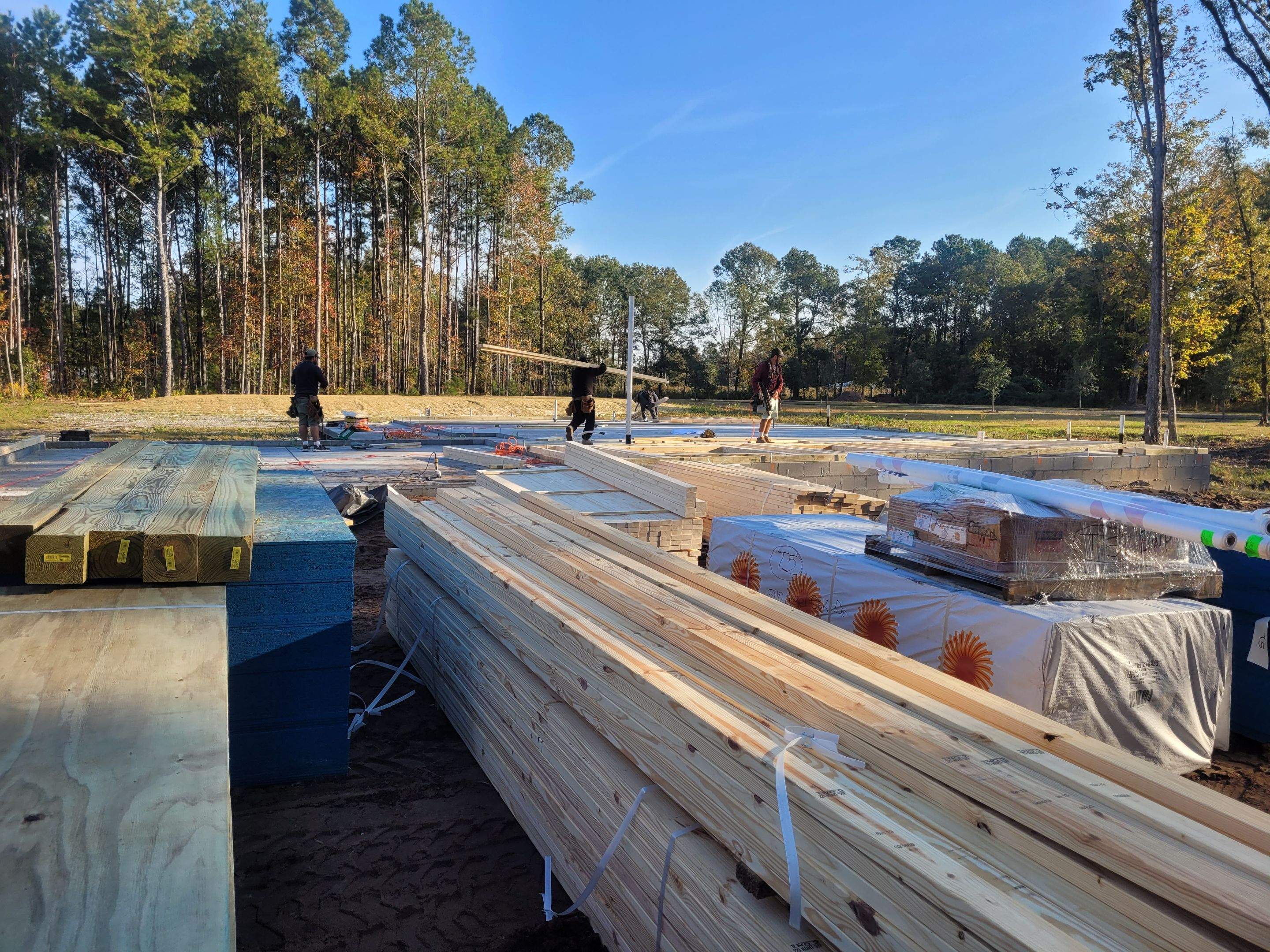 New Home Construction using brick and vertical vinyl by Cornerstone Home Builders, LLC