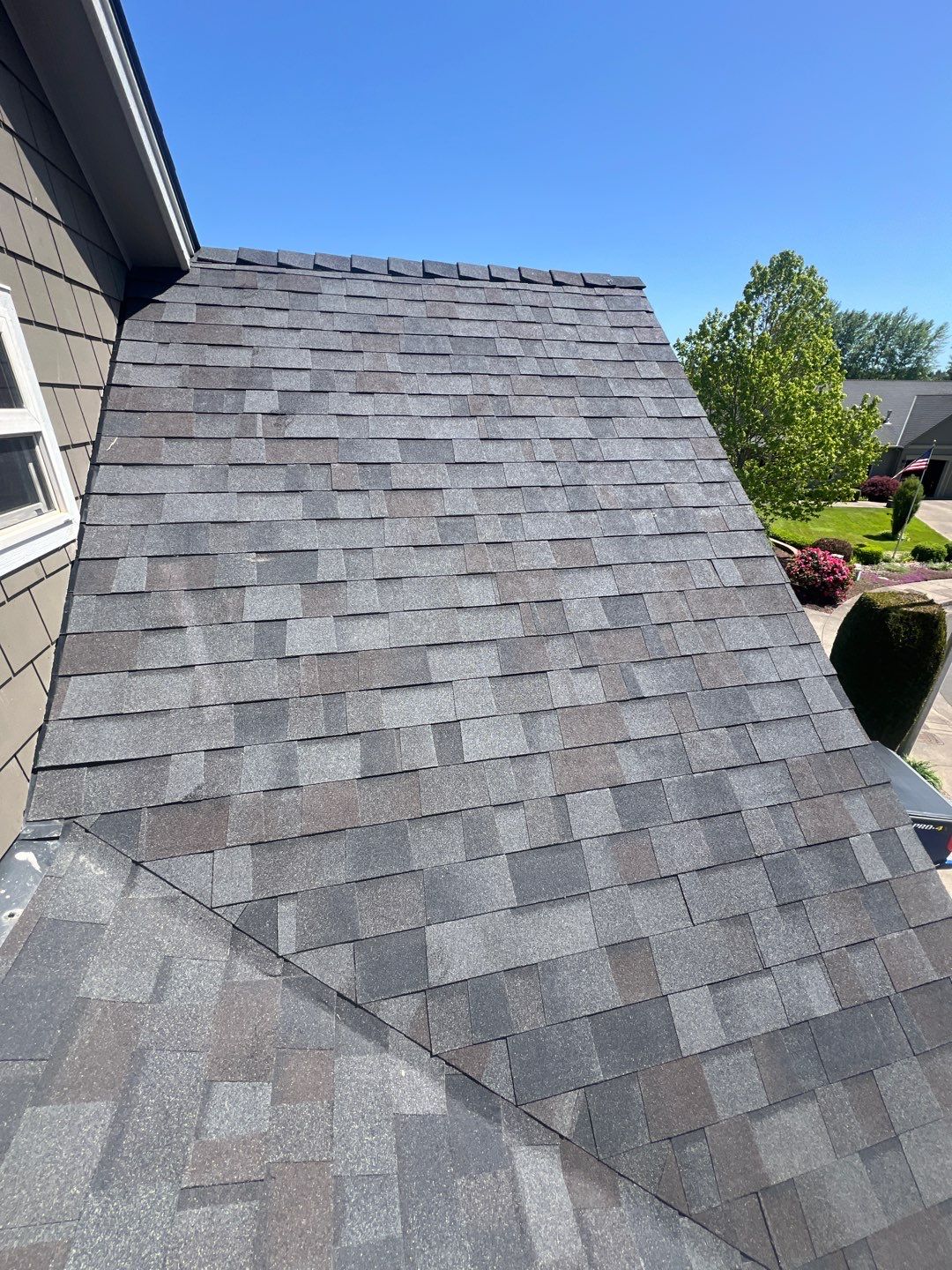 Residential Roofing Installation using Malarkey Vista (Color: Black Oak) by Orezona Building & Roofing Company, Inc.