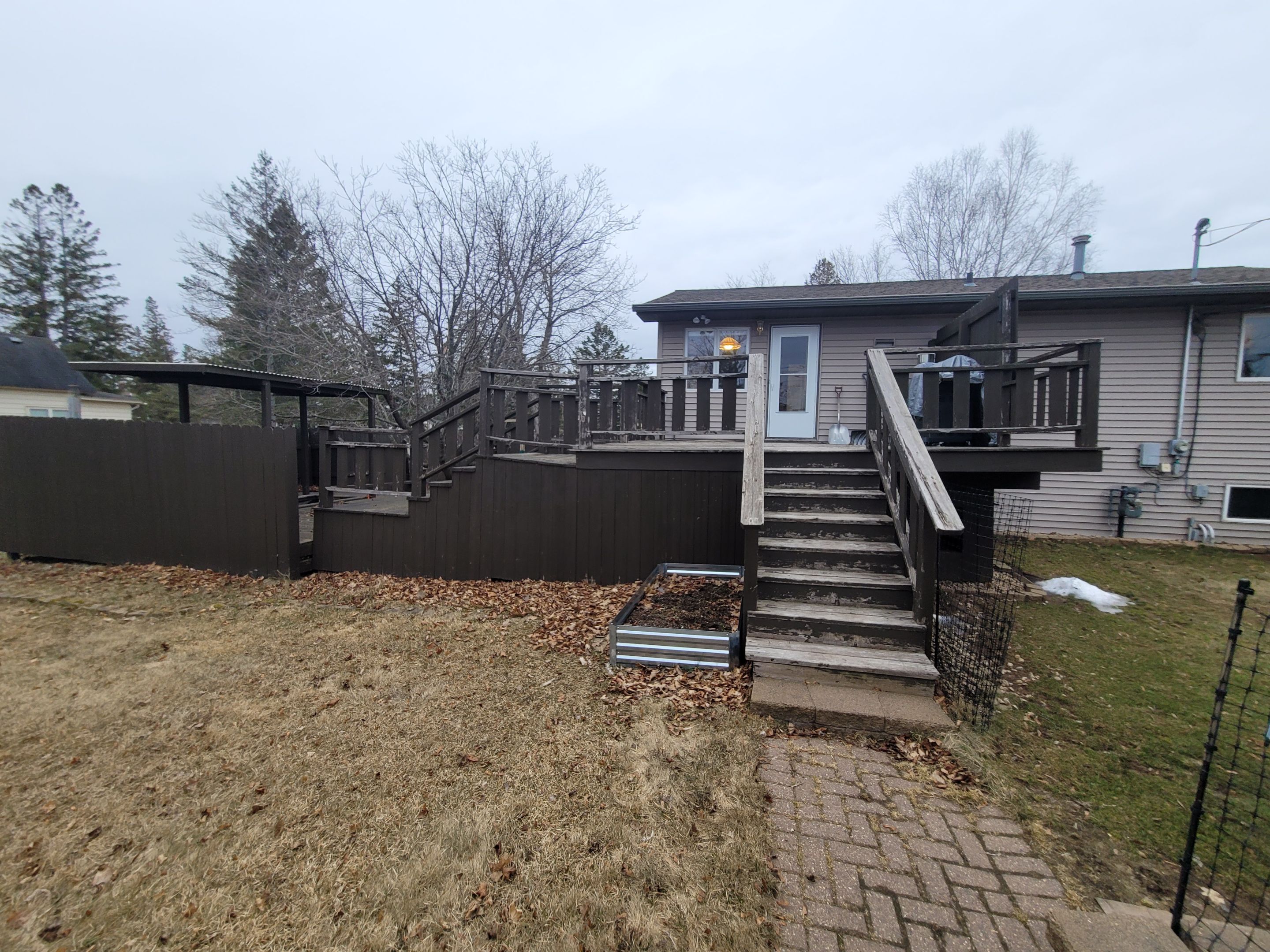 Multi-Level Cedar Deck by Anchor North Property Services