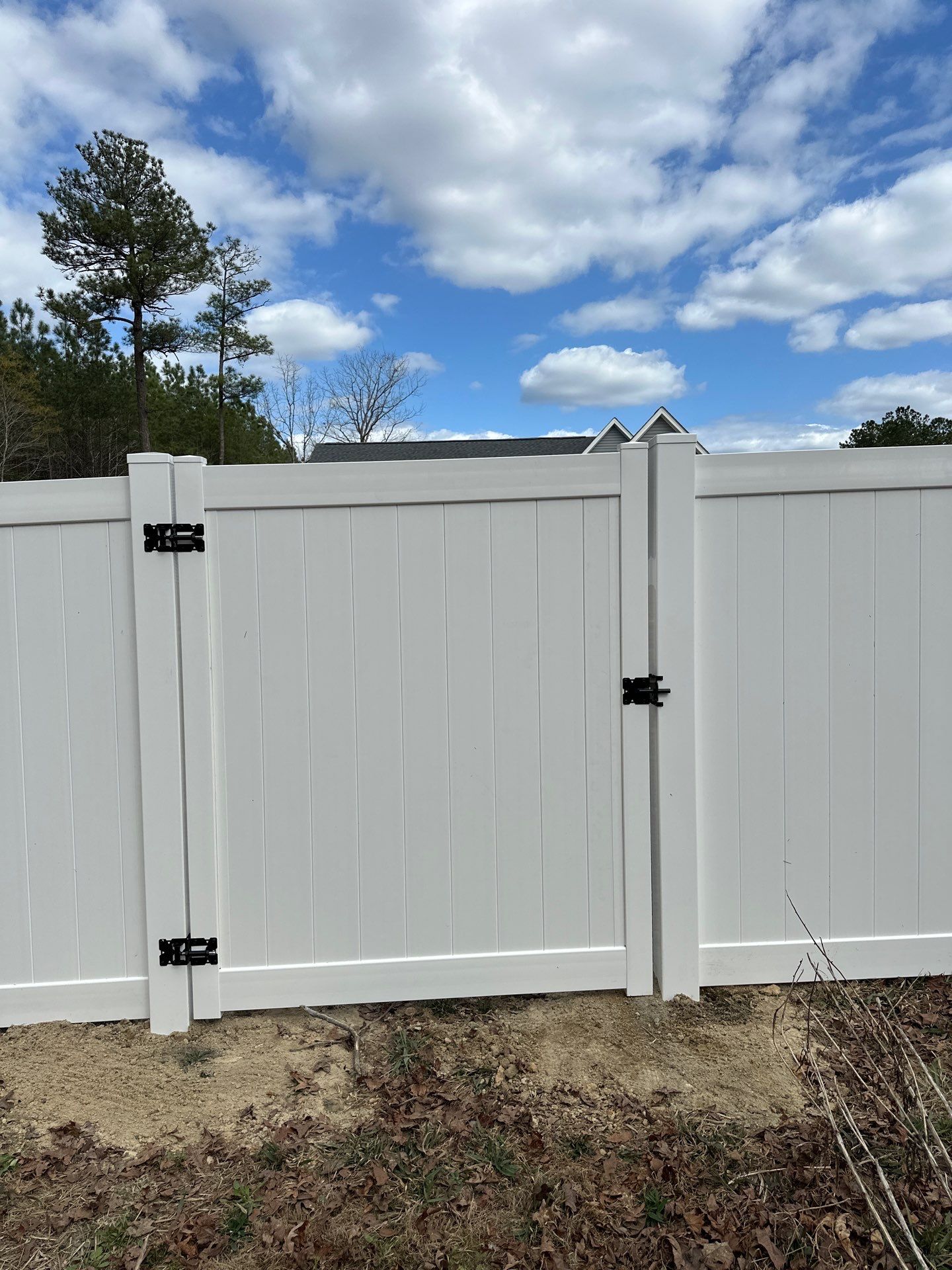 White Vinyl Privacy Fence Installation in Cameron, NC by Superior Fence and Rail