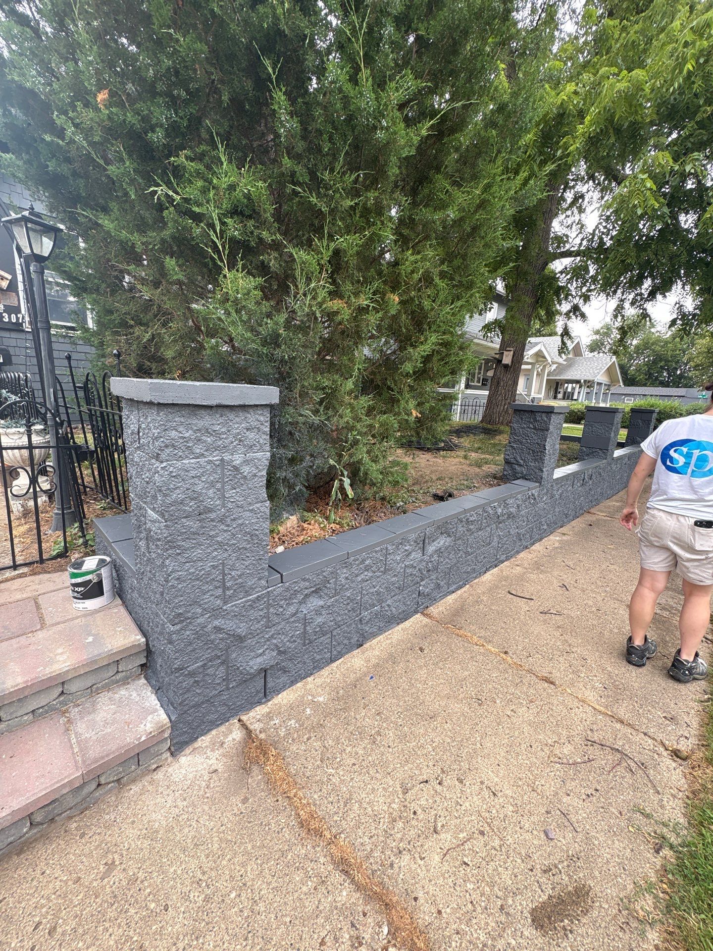 Exterior Masonry Painting for a Sioux Falls Retaining Wall by Select Painting, Coatings & Garage Cabinets